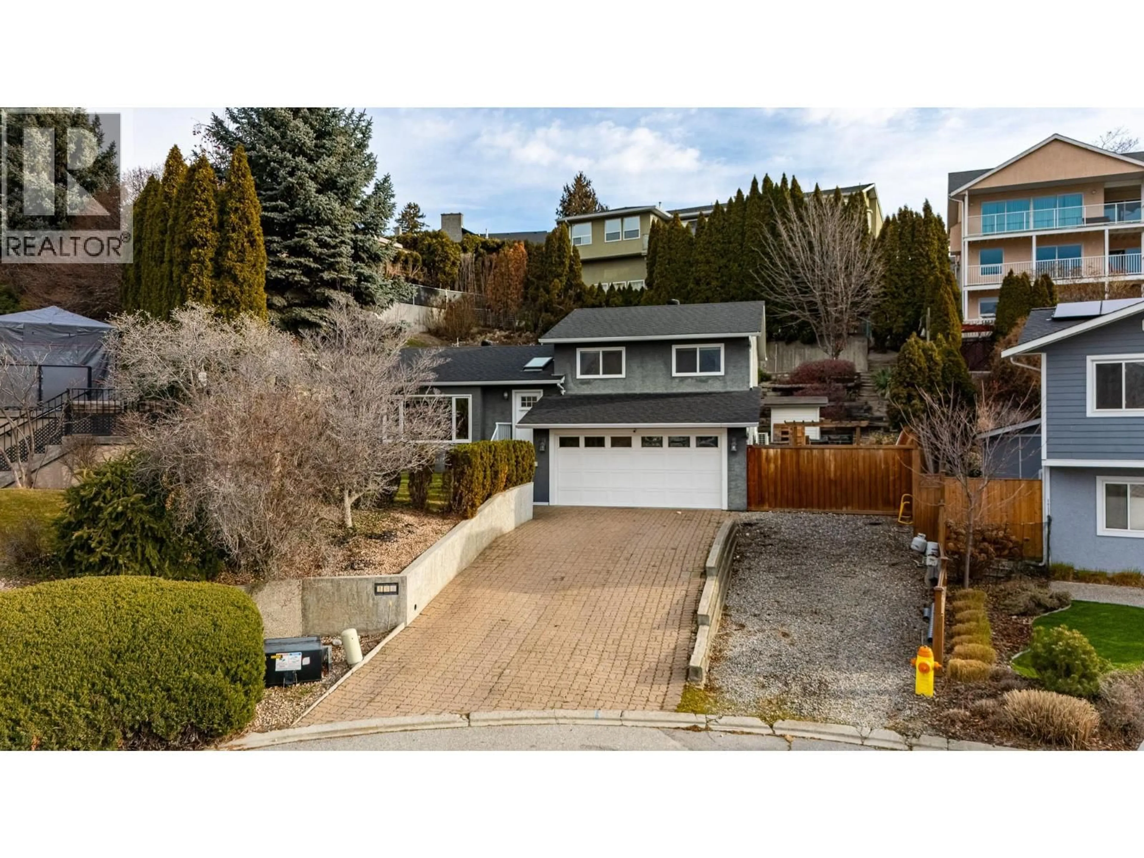 A pic from outside/outdoor area/front of a property/back of a property/a pic from drone, street for 154 DAFOE PLACE, Penticton British Columbia V0H7E6