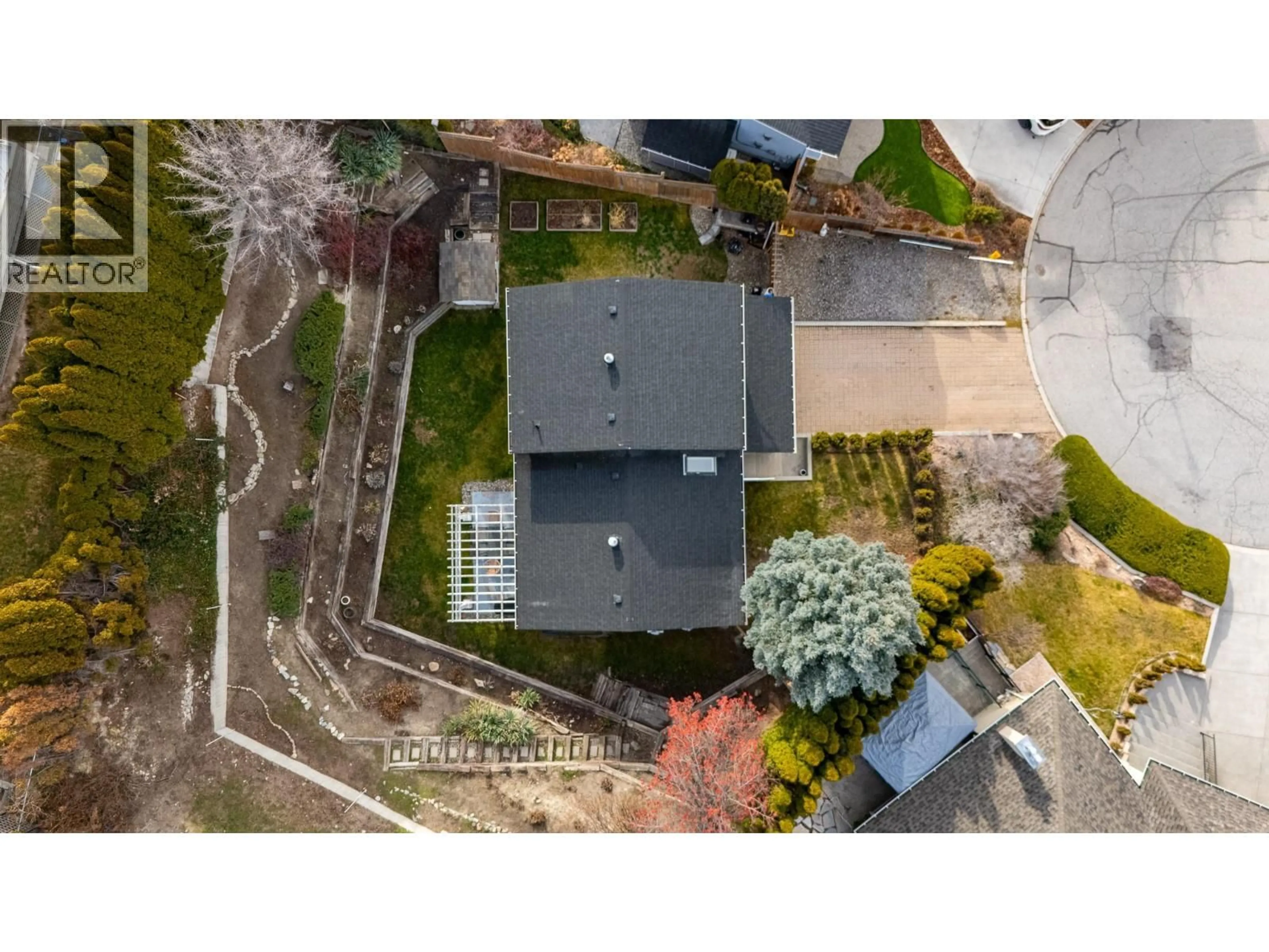 A pic from outside/outdoor area/front of a property/back of a property/a pic from drone, street for 154 DAFOE PLACE, Penticton British Columbia V0H7E6