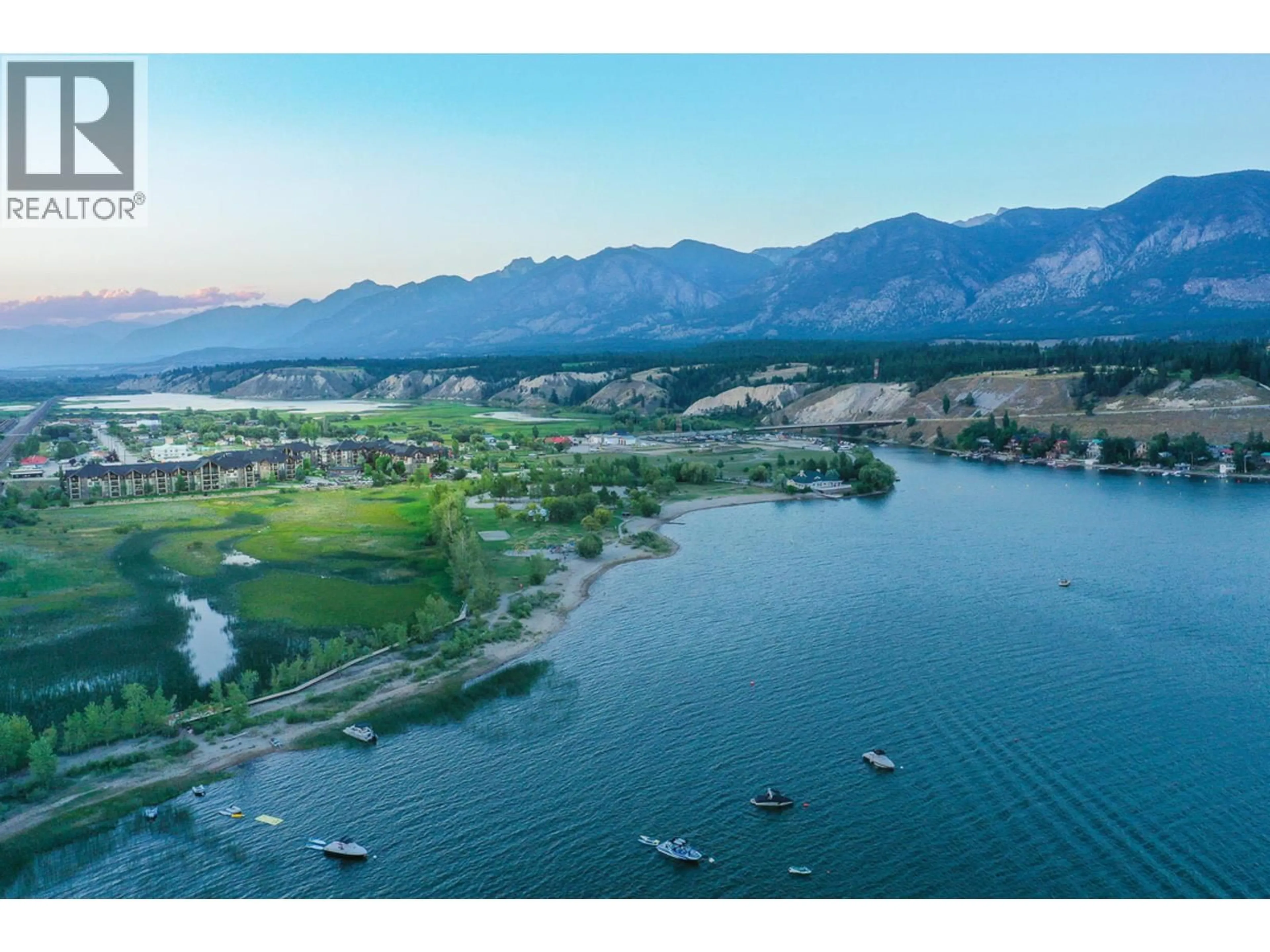 A pic from outside/outdoor area/front of a property/back of a property/a pic from drone, water/lake/river/ocean view for 2318 - 205 THIRD AVENUE, Invermere British Columbia V0A1K7