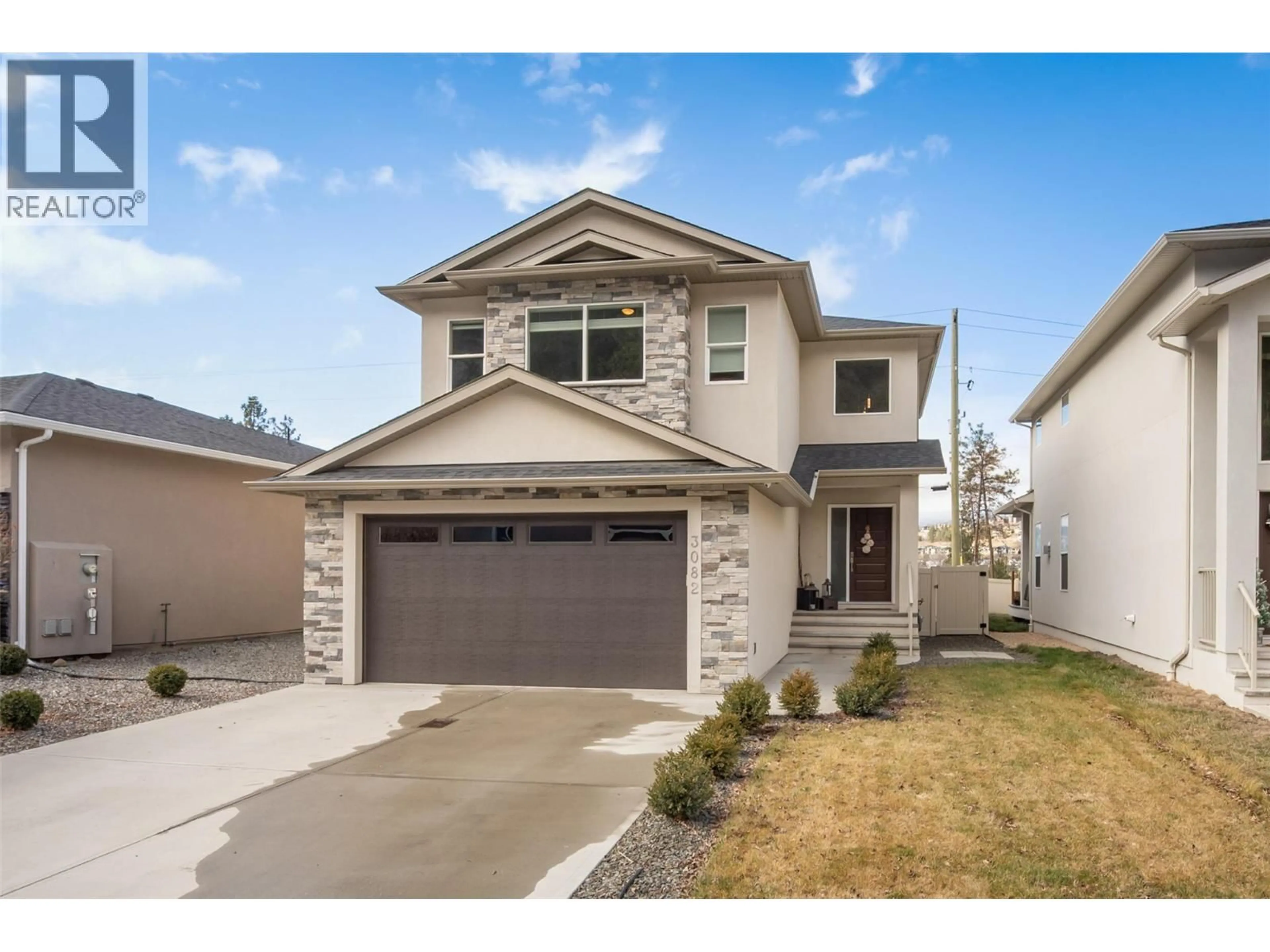 Home with vinyl exterior material, street for 3082 RIESLING WAY, West Kelowna British Columbia V4T3M7