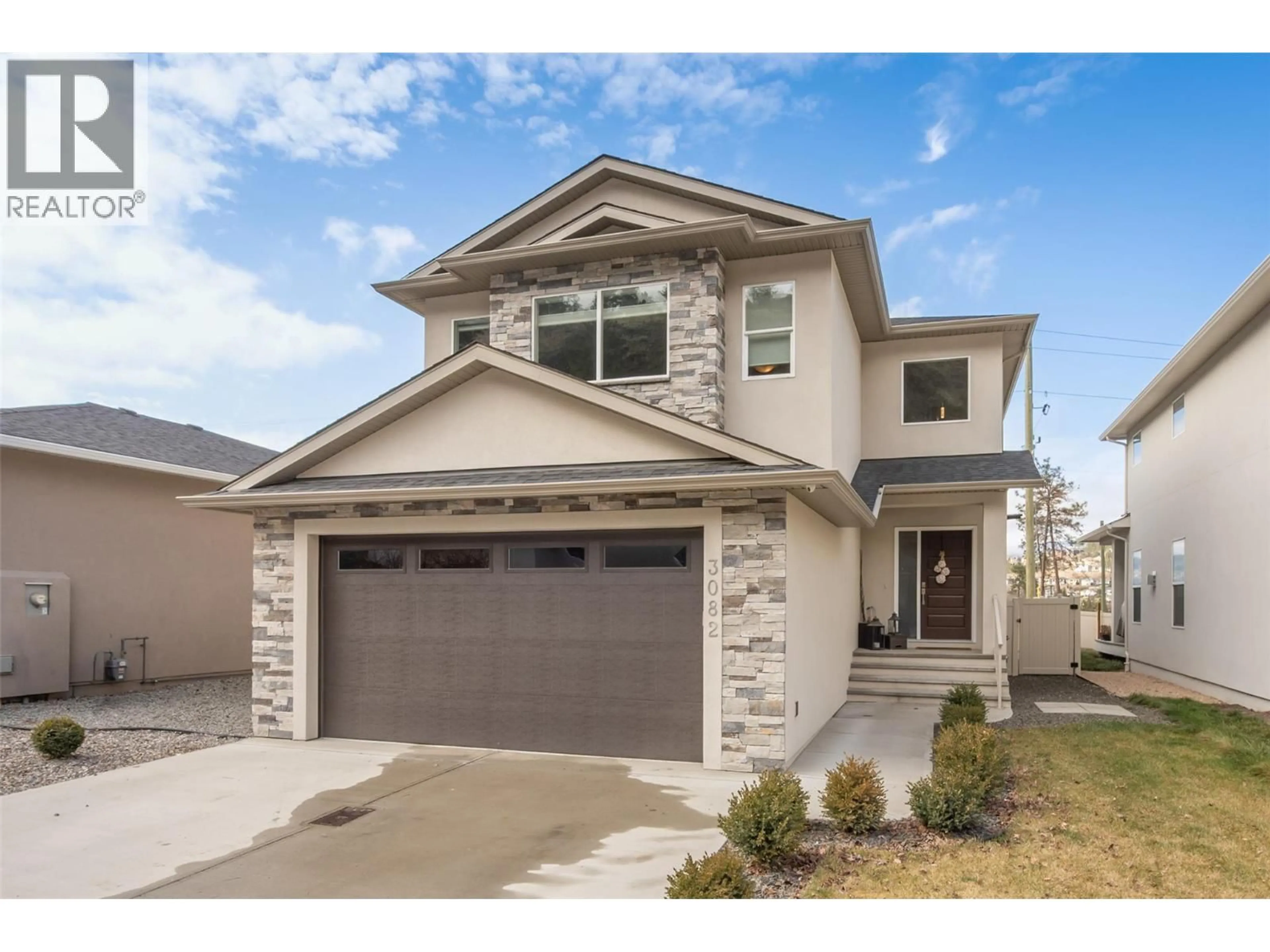 Home with brick exterior material, street for 3082 RIESLING WAY, West Kelowna British Columbia V4T3M7