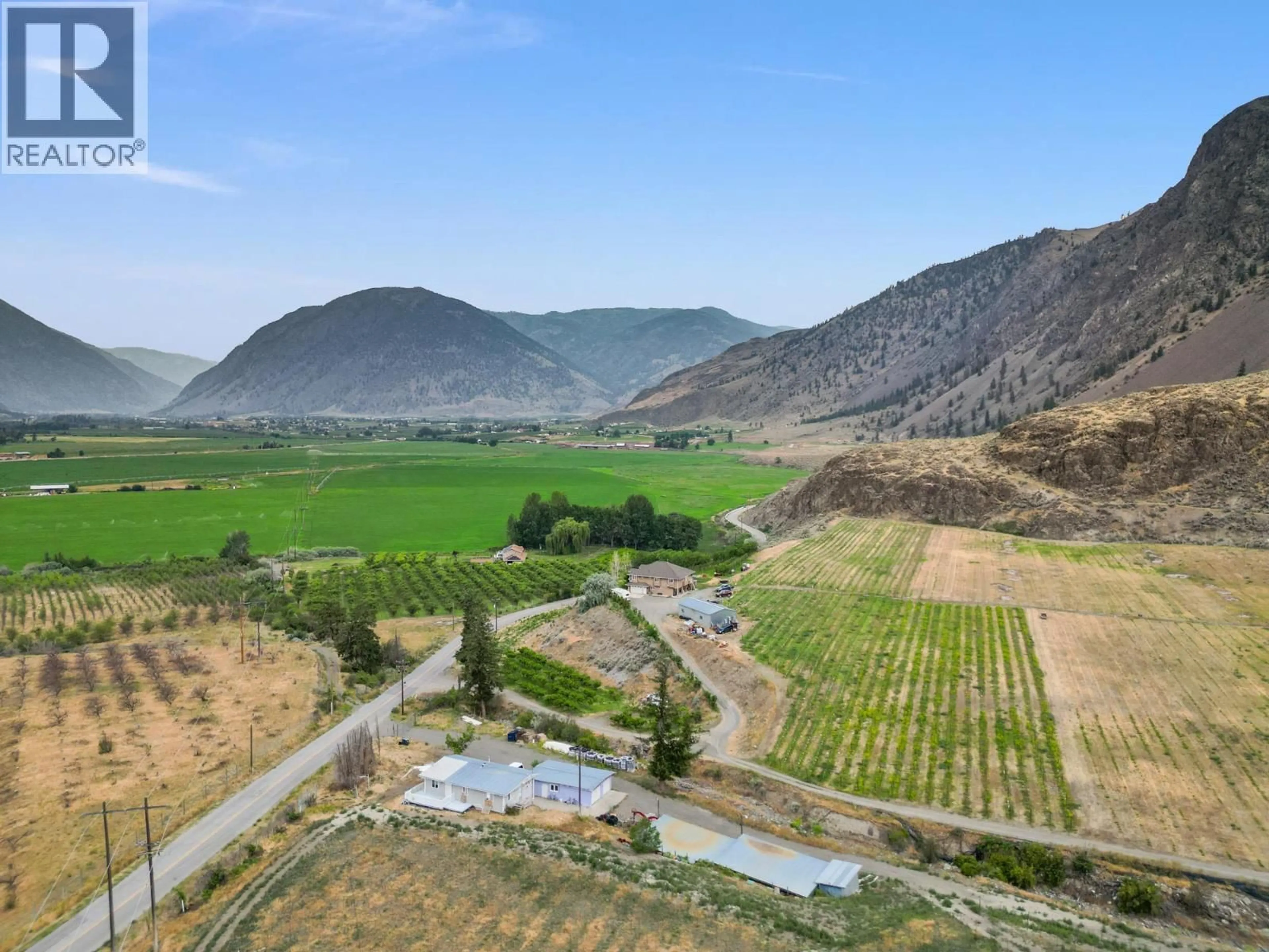 A pic from outside/outdoor area/front of a property/back of a property/a pic from drone, mountain view for 2300 UPPER BENCH ROAD, Cawston British Columbia V0X1C2