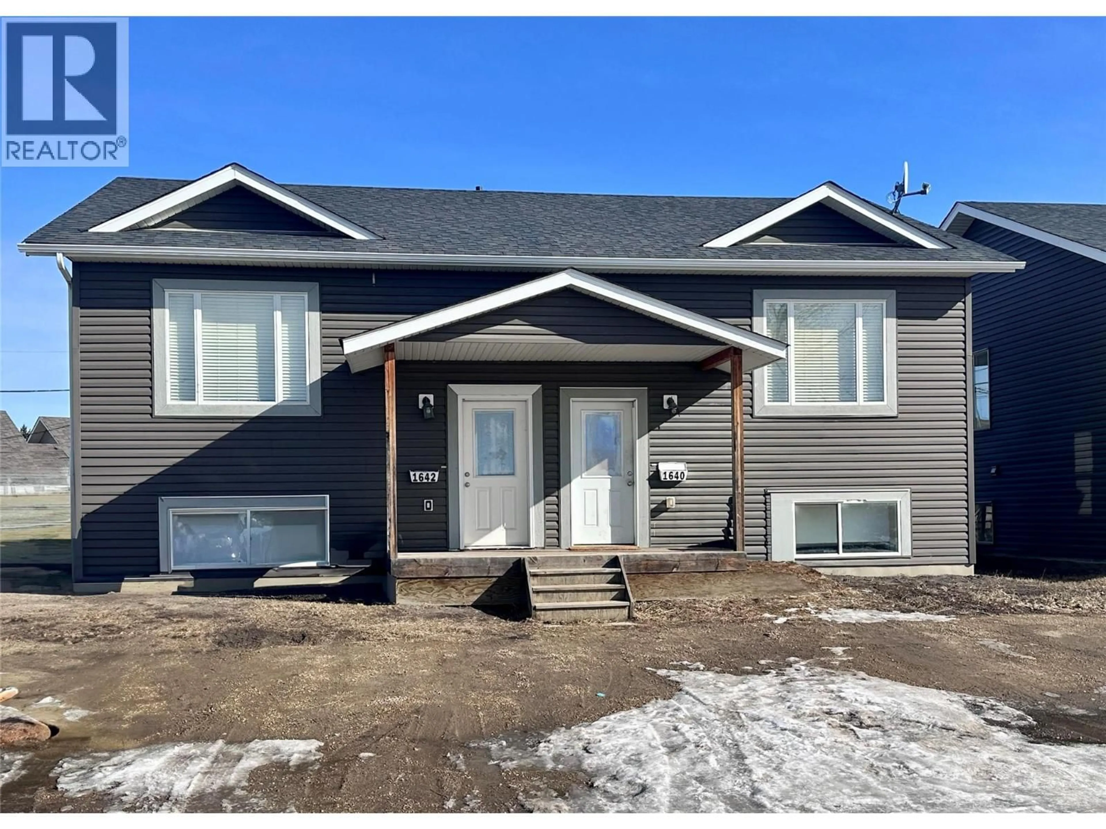 Home with vinyl exterior material, street for 1640 101 AVENUE, Dawson Creek British Columbia V1G2G9