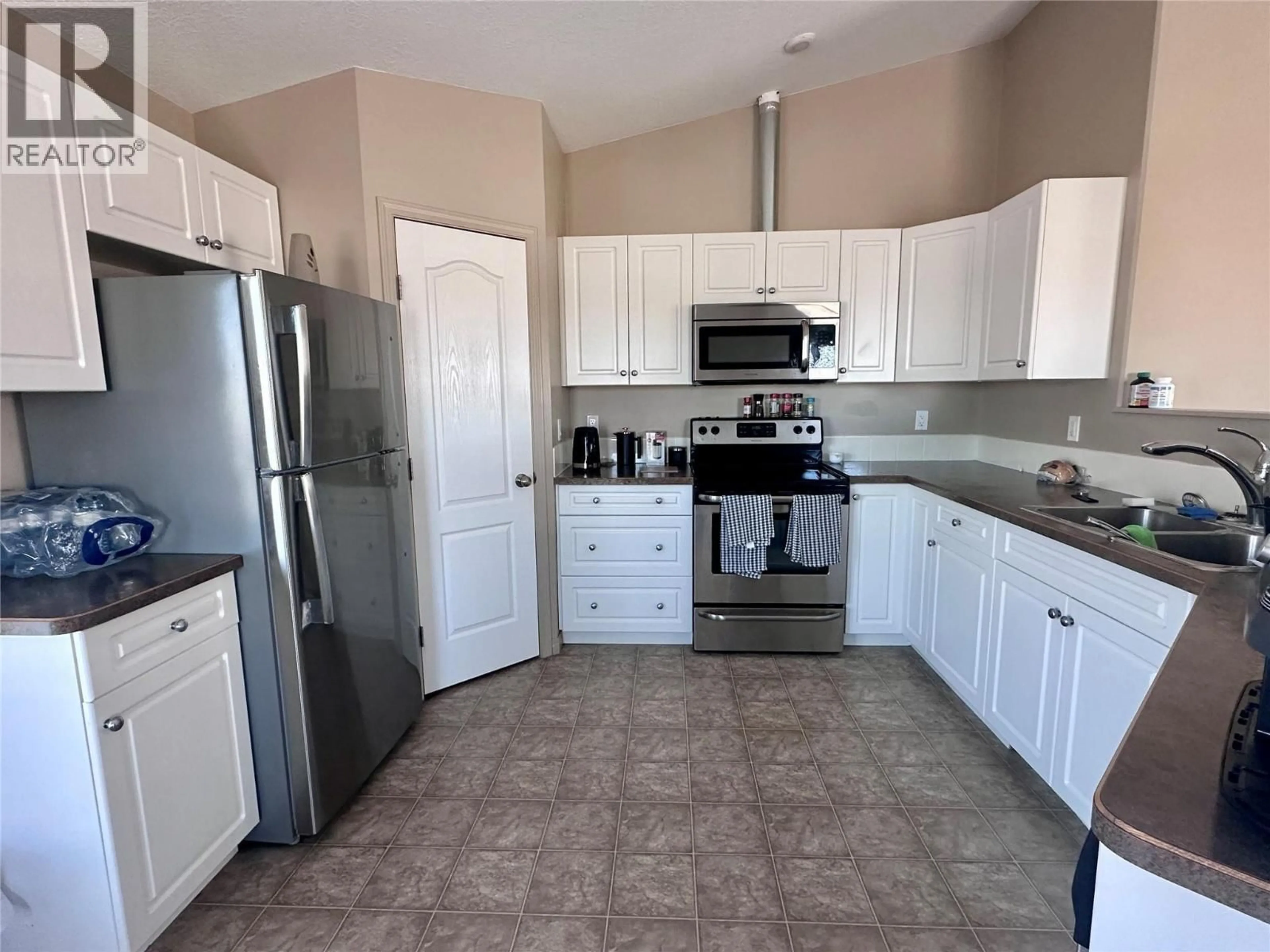 Standard kitchen, ceramic/tile floor for 1640 101 AVENUE, Dawson Creek British Columbia V1G2G9