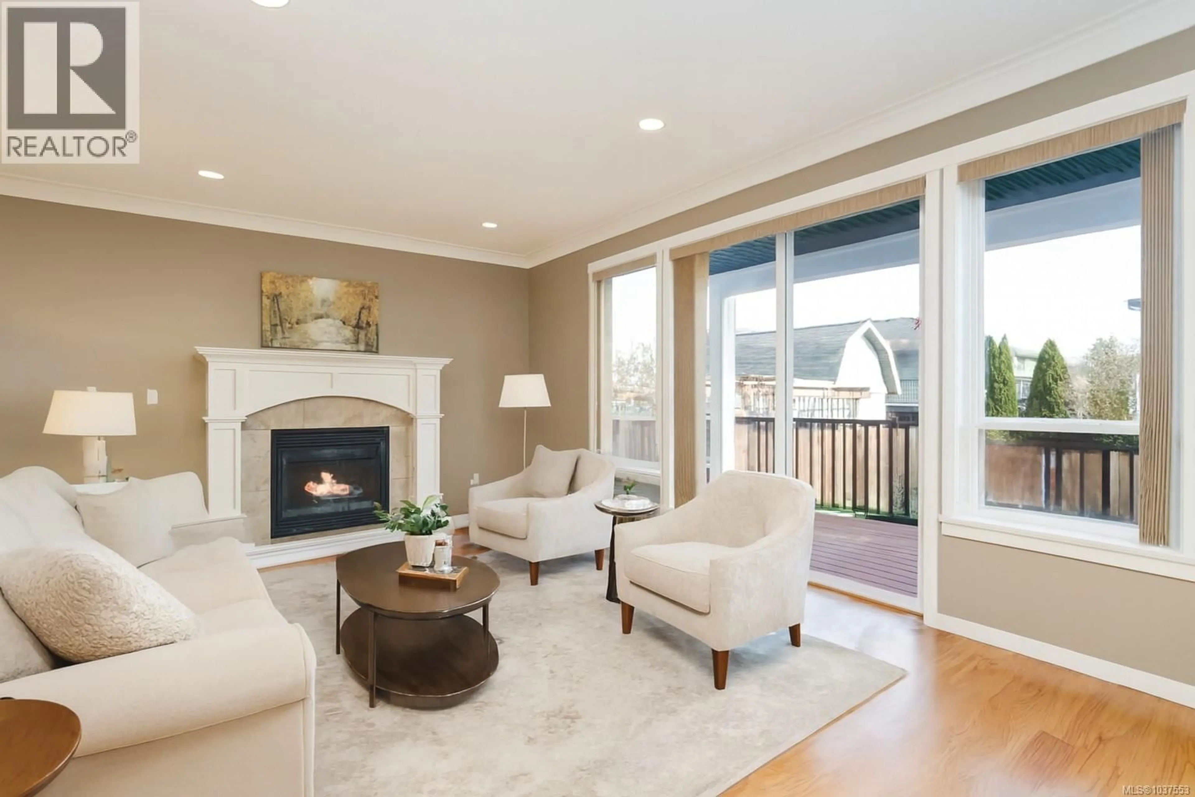 Living room with furniture, wood/laminate floor for 2075 DOVER STREET, Sooke British Columbia V9Z1L1