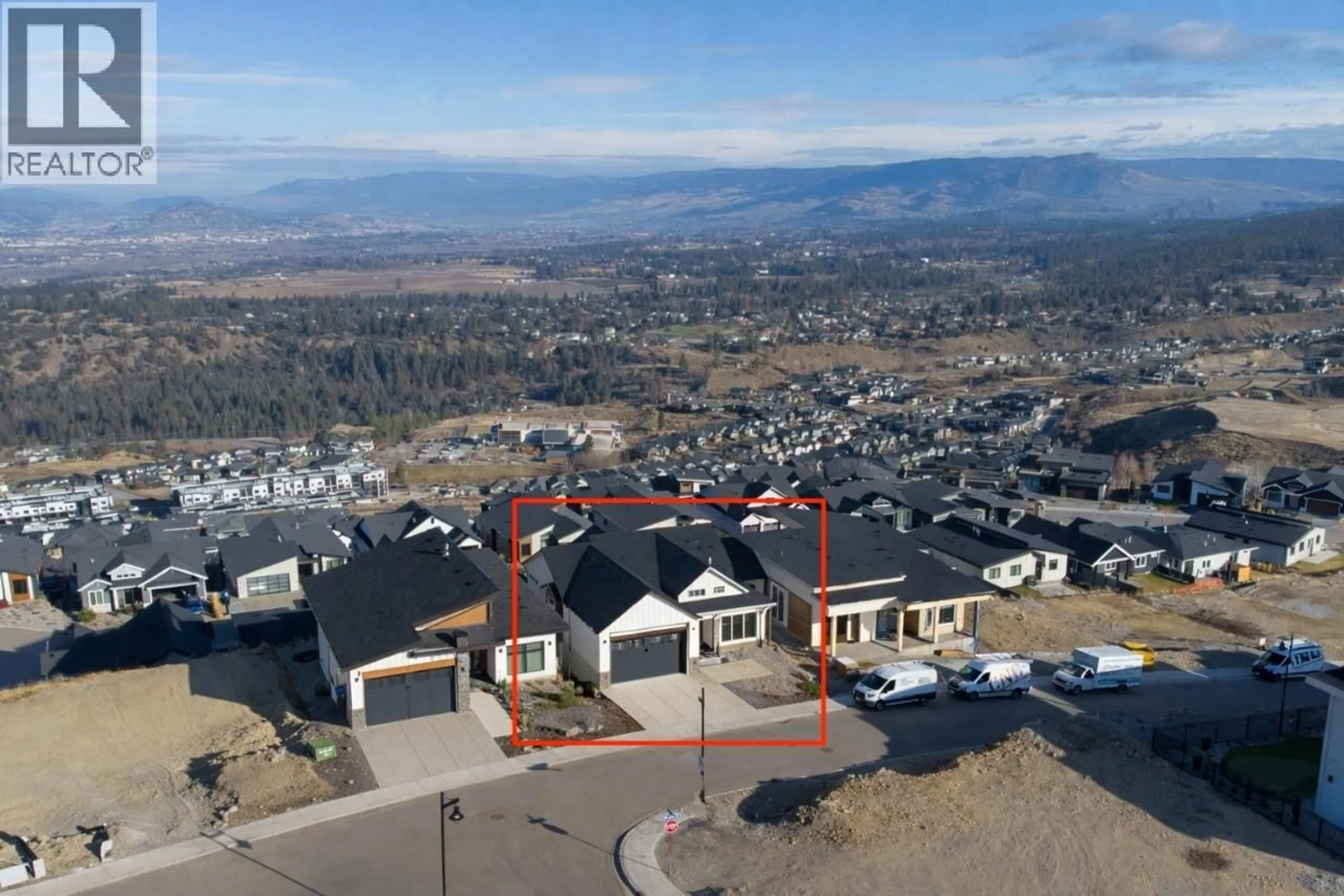 A pic from outside/outdoor area/front of a property/back of a property/a pic from drone, mountain view for 1080 HEWETSON AVENUE, Kelowna British Columbia V1W5H6
