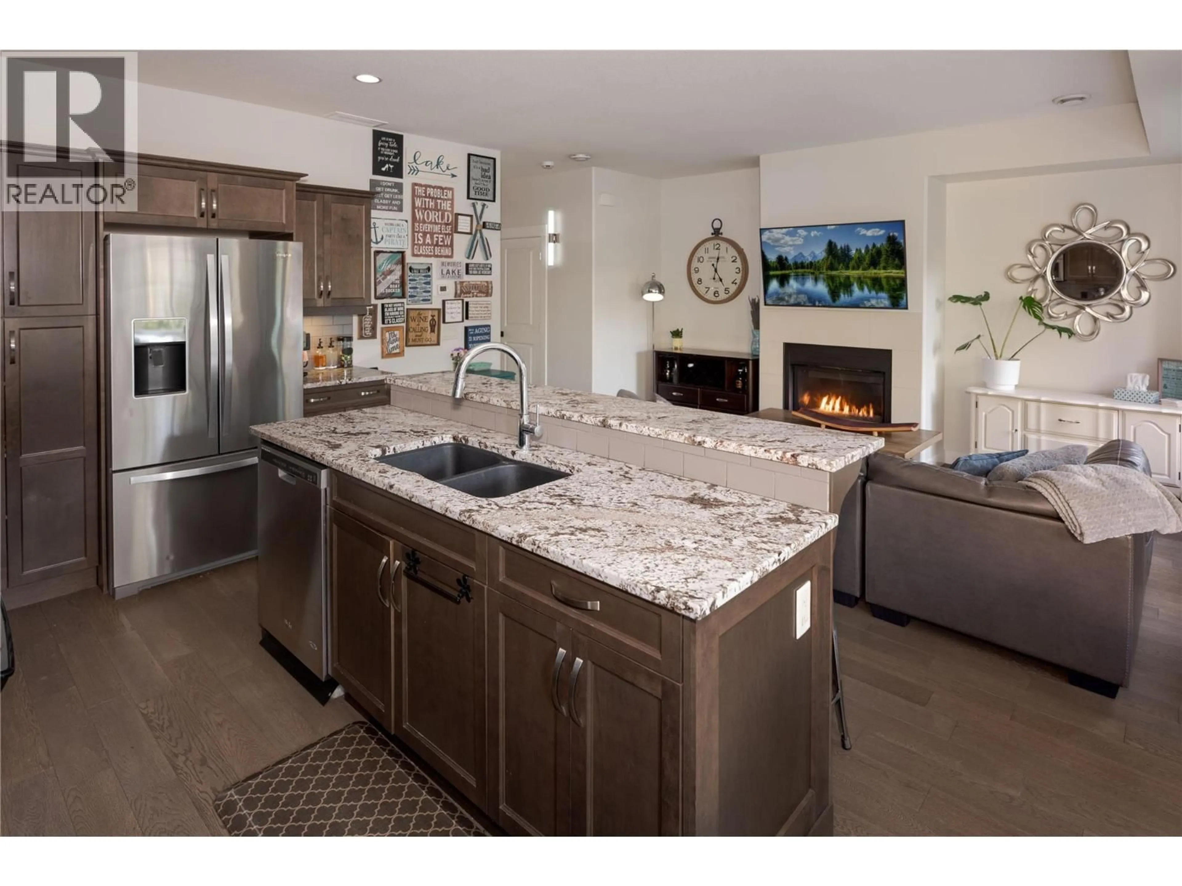 Open concept kitchen, ceramic/tile floor for 703 - 3350 WOODSDALE ROAD, Lake Country British Columbia V4V2R7
