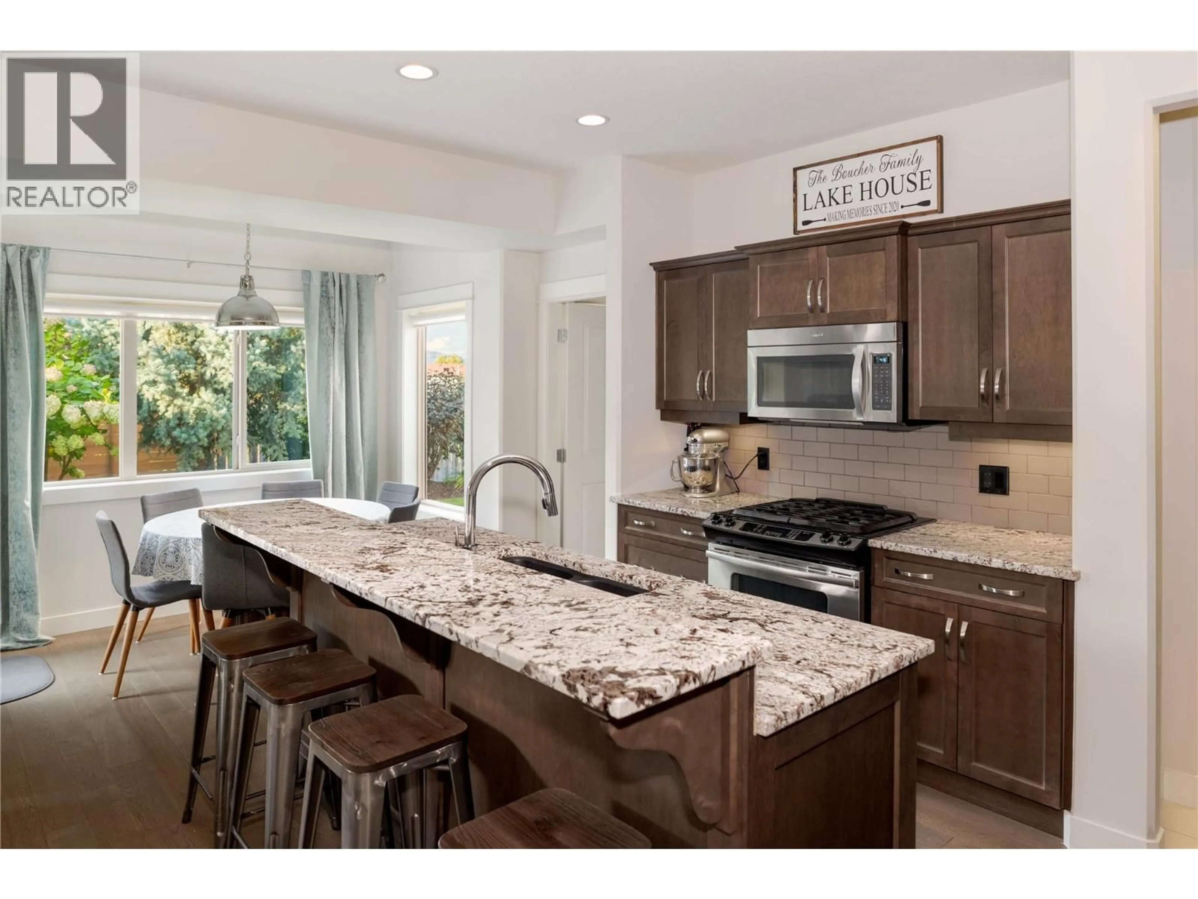 Open concept kitchen, ceramic/tile floor for 703 - 3350 WOODSDALE ROAD, Lake Country British Columbia V4V2R7