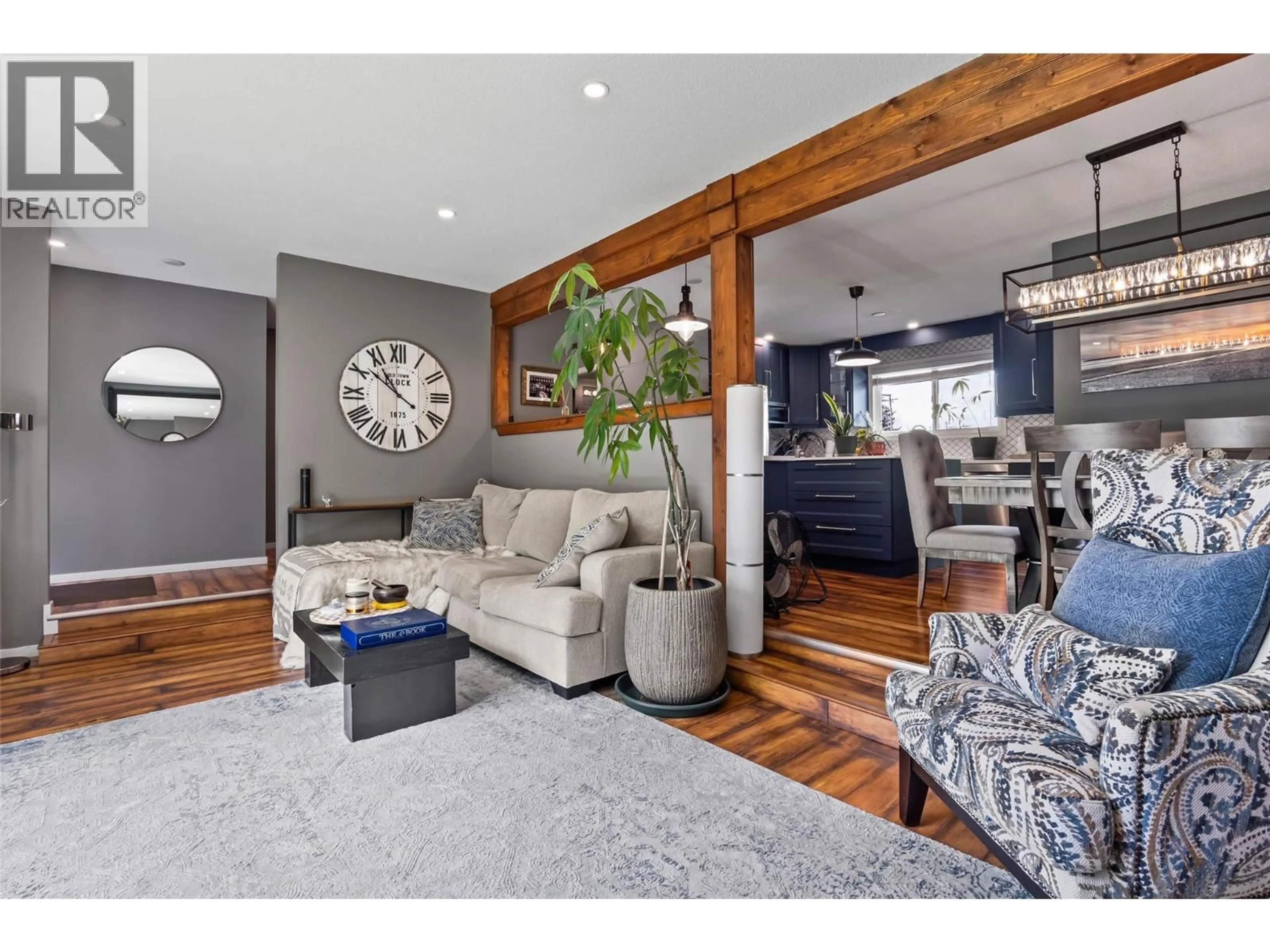 Living room with furniture, wood/laminate floor for 1191 SCHUBERT DRIVE, Kamloops British Columbia V2B7M4
