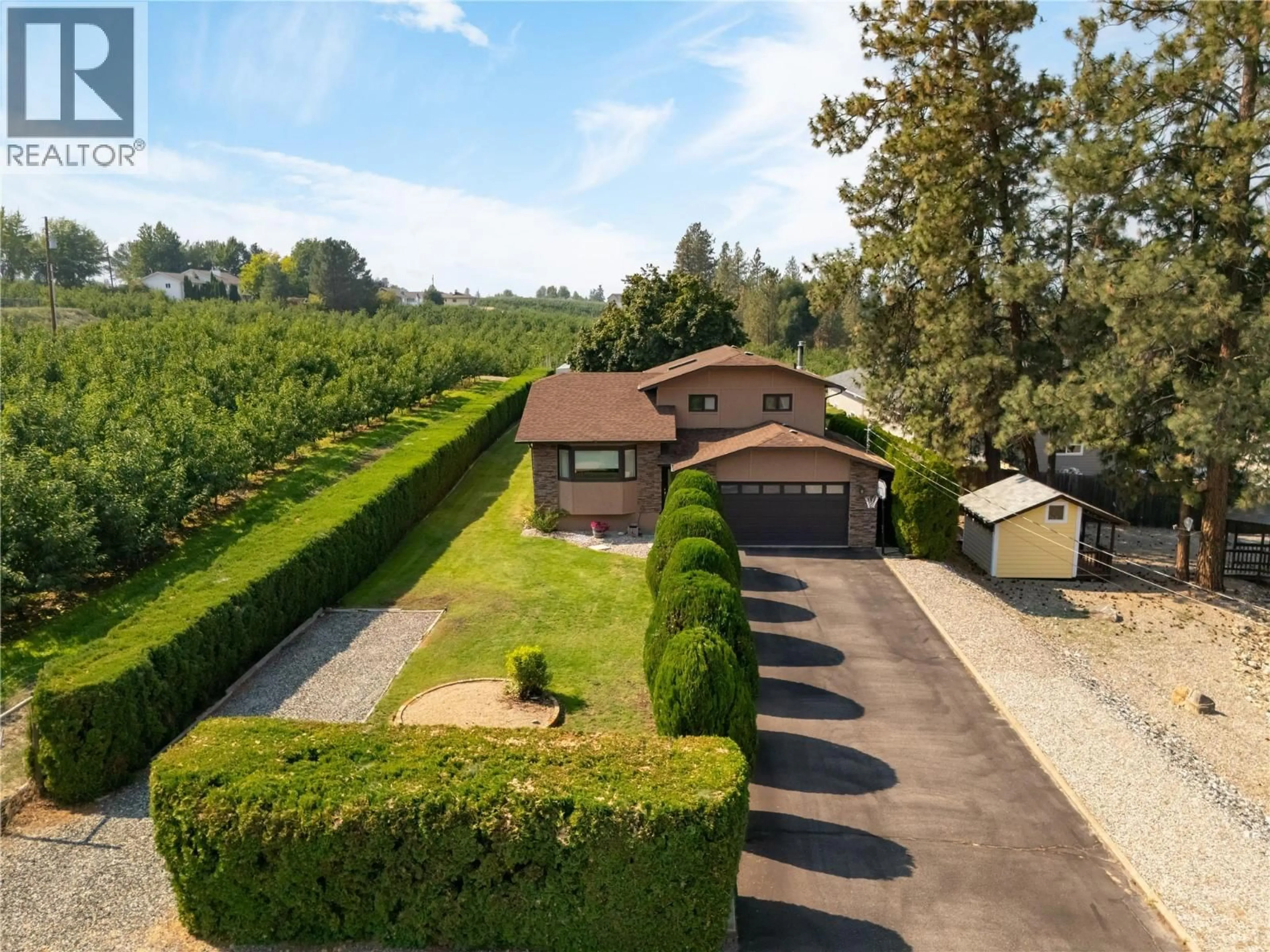 A pic from outside/outdoor area/front of a property/back of a property/a pic from drone, unknown for 3970 JUNE SPRINGS ROAD, Kelowna British Columbia V1W4E4