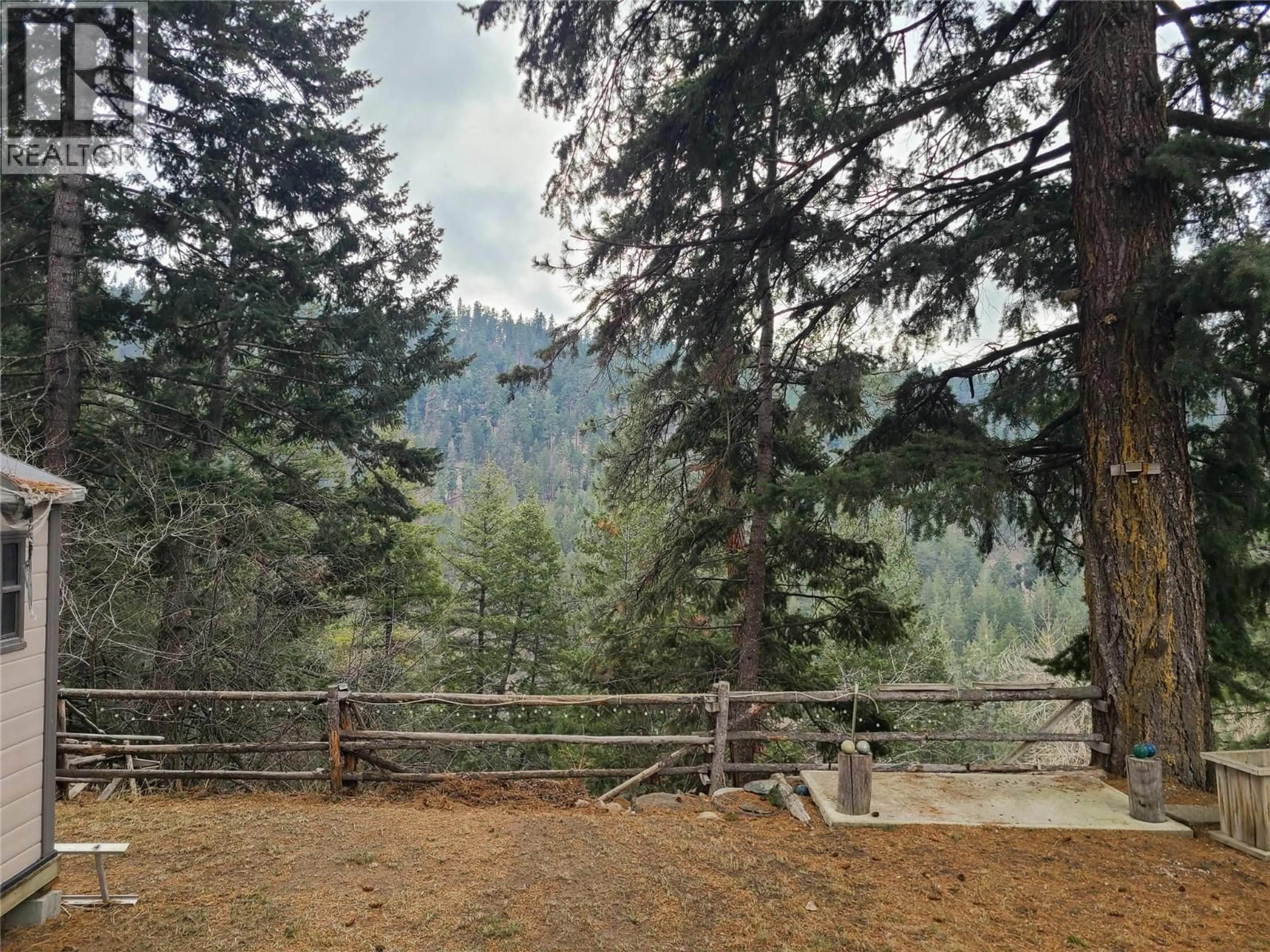 A pic from outside/outdoor area/front of a property/back of a property/a pic from drone, forest/trees view for 24 - 5371 PRINCETON AVENUE, Peachland British Columbia V0H1X8