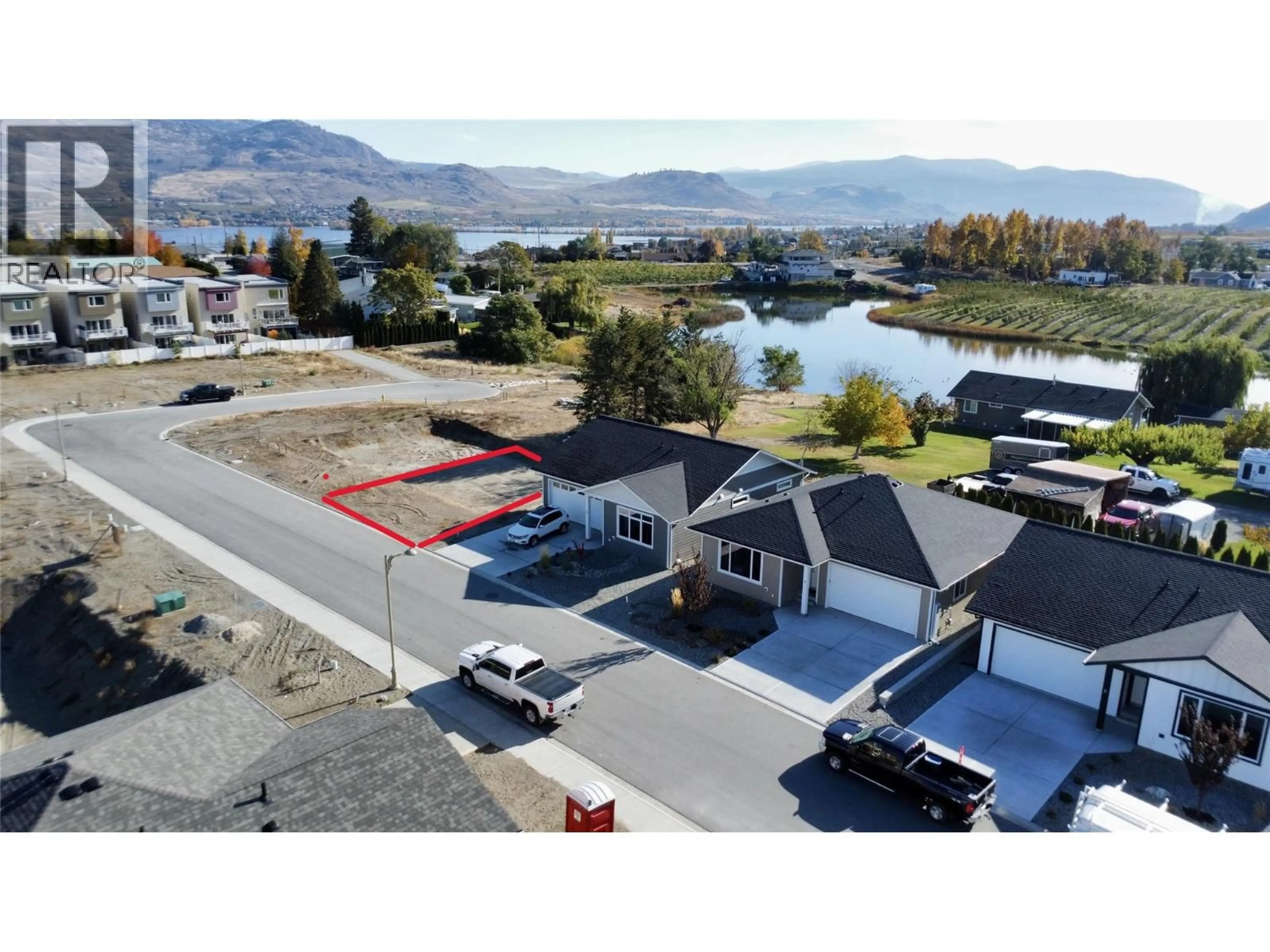 A pic from outside/outdoor area/front of a property/back of a property/a pic from drone, water/lake/river/ocean view for 13 WOOD DUCK WAY, Osoyoos British Columbia V0H1V5