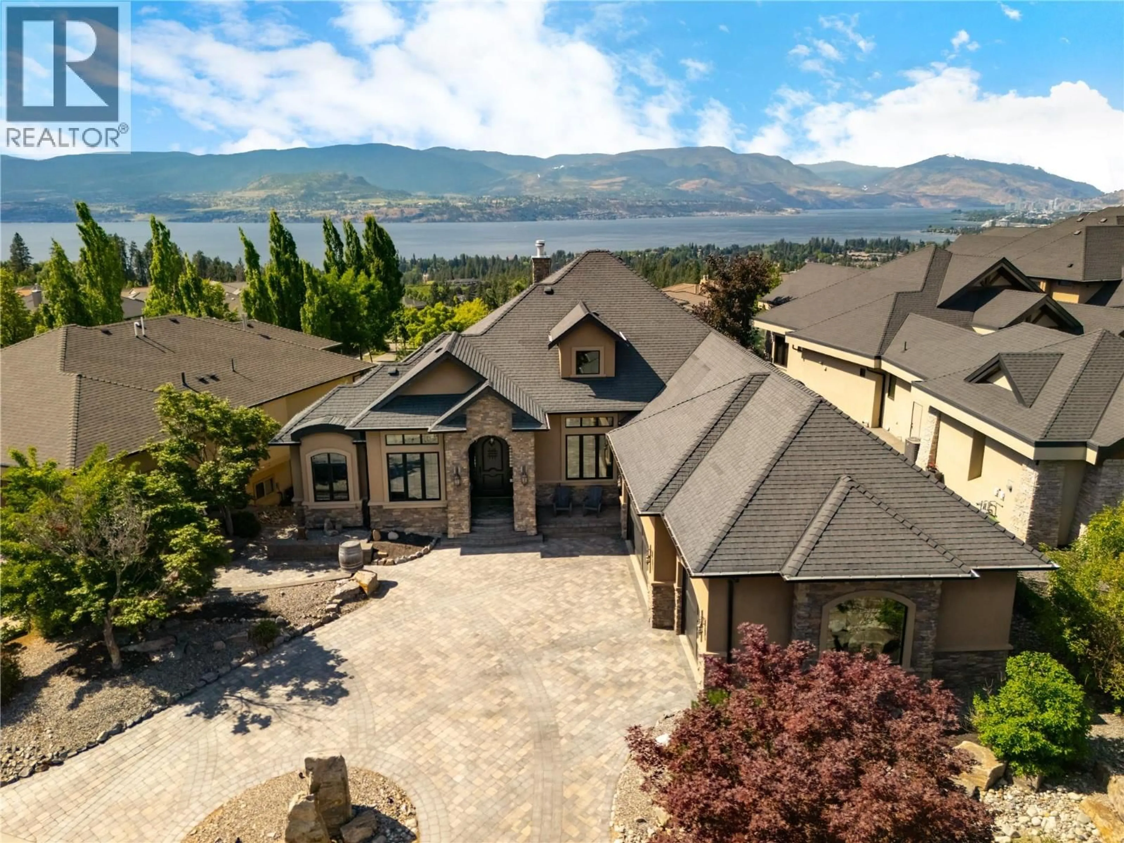 A pic from outside/outdoor area/front of a property/back of a property/a pic from drone, mountain view for 710 ARBOR VIEW DRIVE, Kelowna British Columbia V1W4Y2
