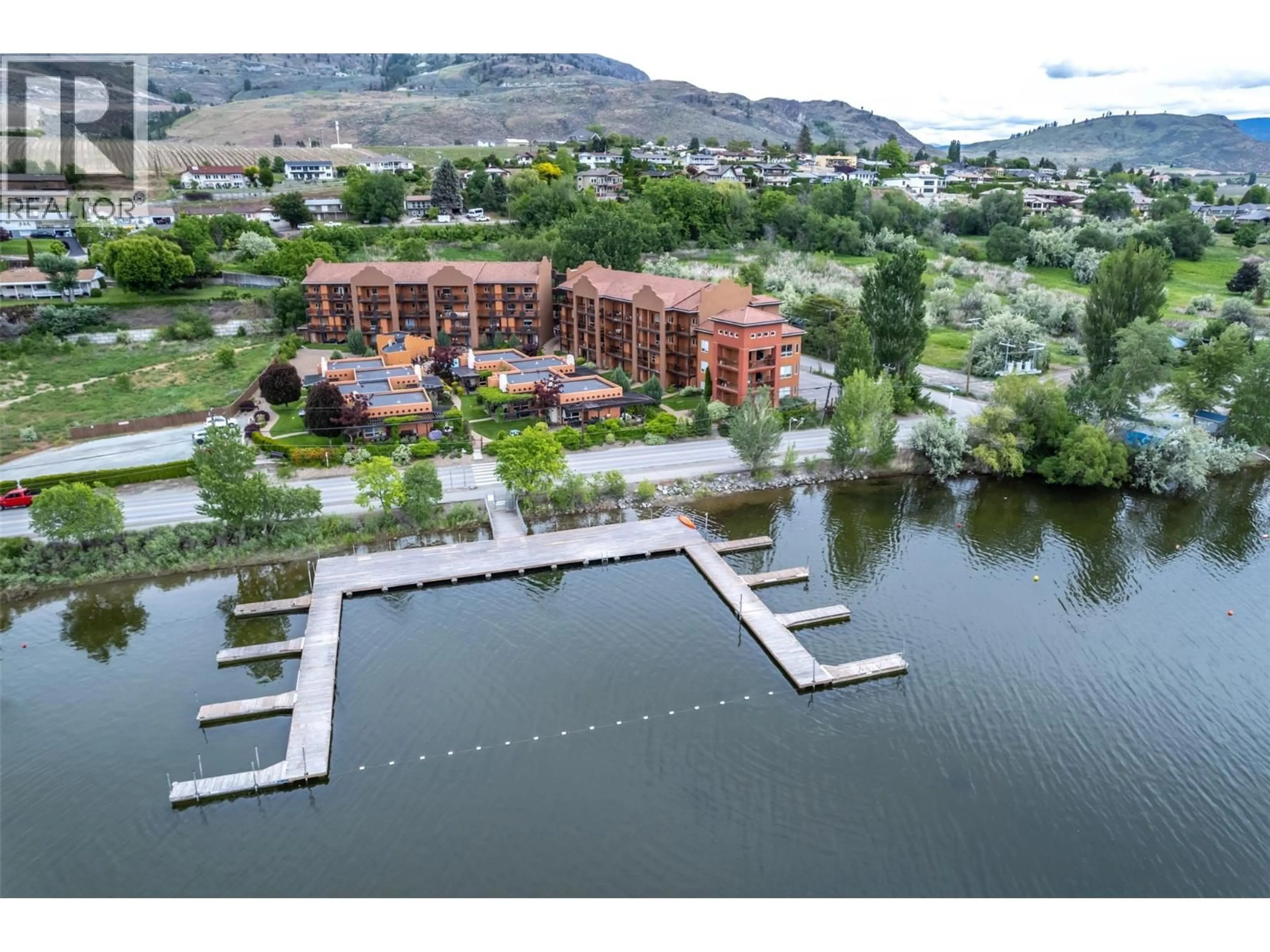 A pic from outside/outdoor area/front of a property/back of a property/a pic from drone, water/lake/river/ocean view for 110 - 4300 44TH AVENUE, Osoyoos British Columbia V0H1V6