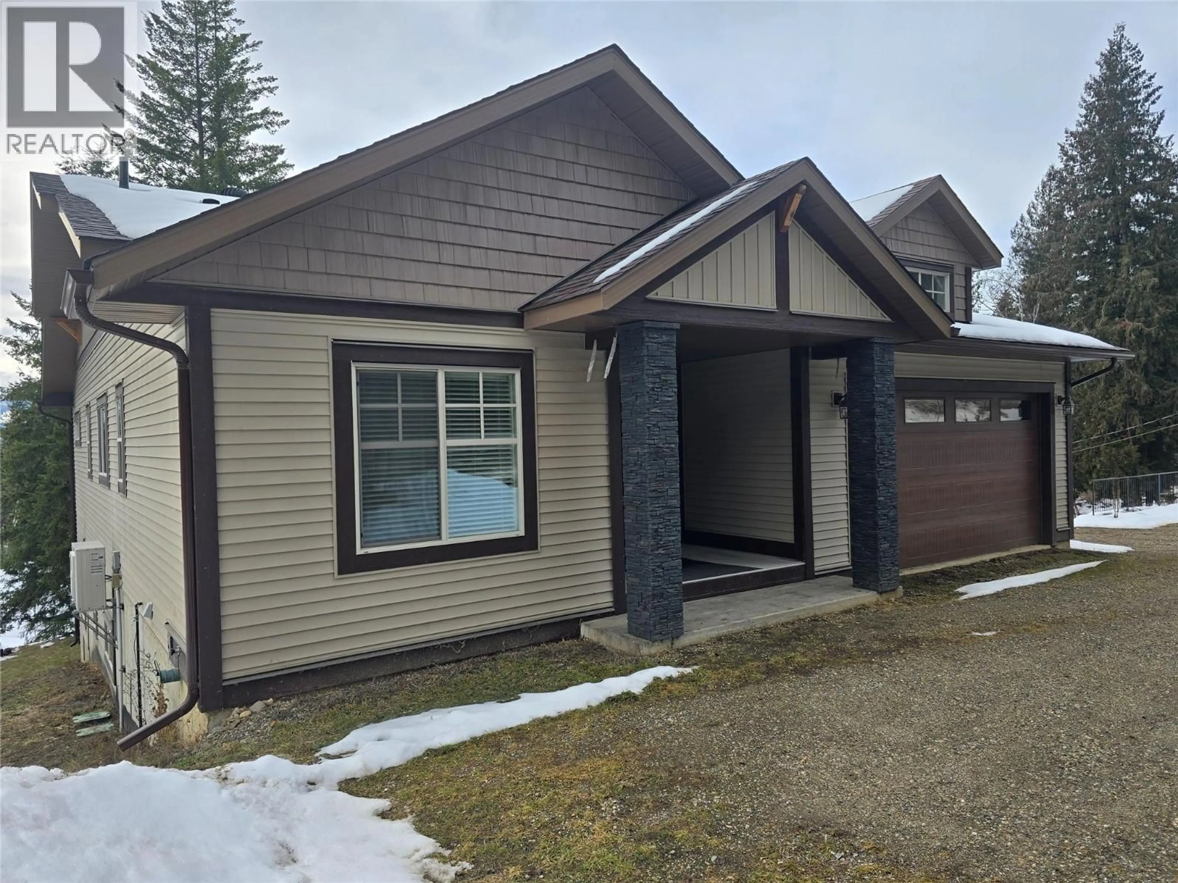 Home with vinyl exterior material, street for 565 CLEARWATER VALLEY ROAD, Clearwater British Columbia V0E1N1