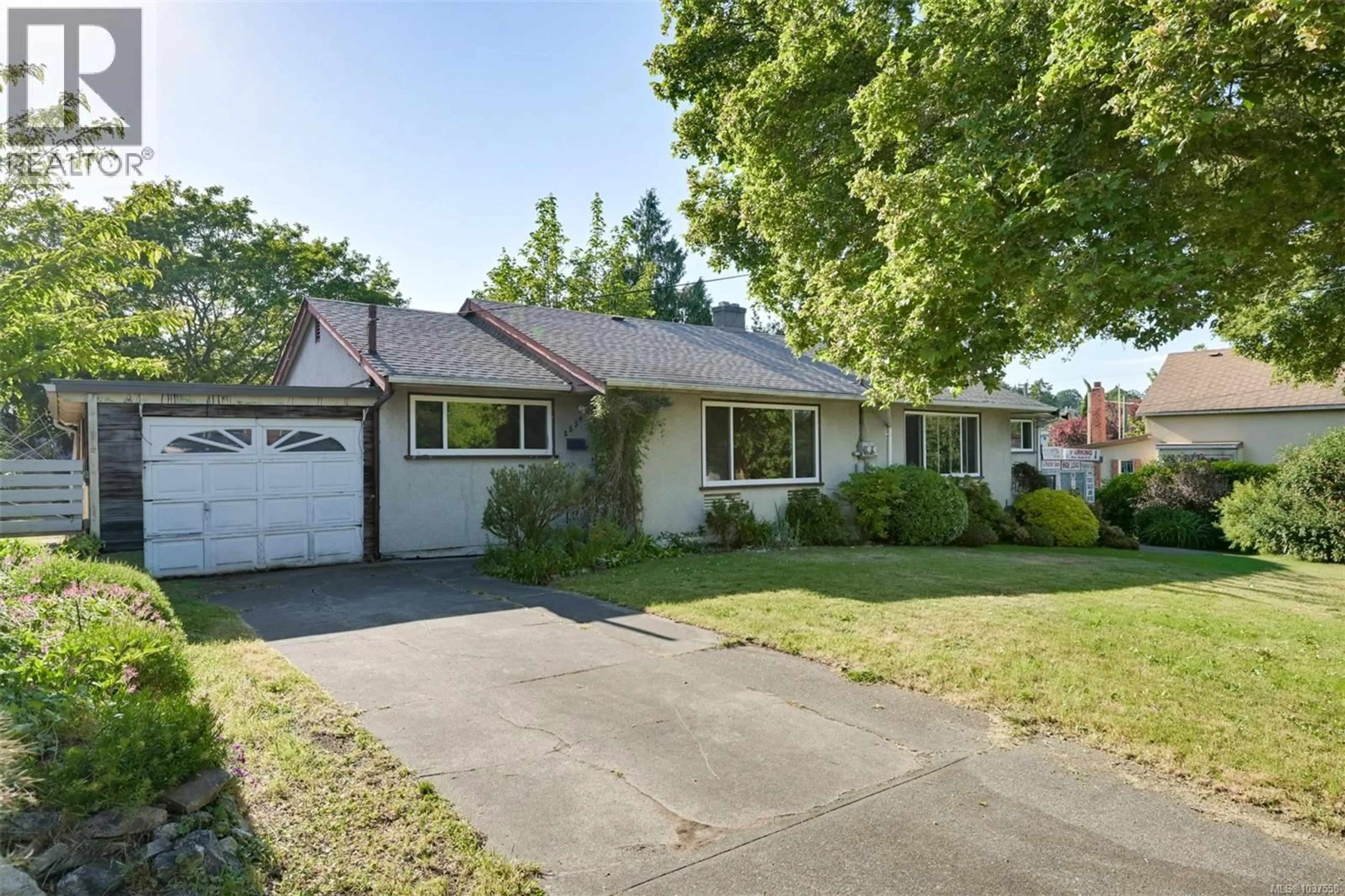 Home with vinyl exterior material, street for 2550/2552 BELMONT AVENUE, Victoria British Columbia V8R4A4