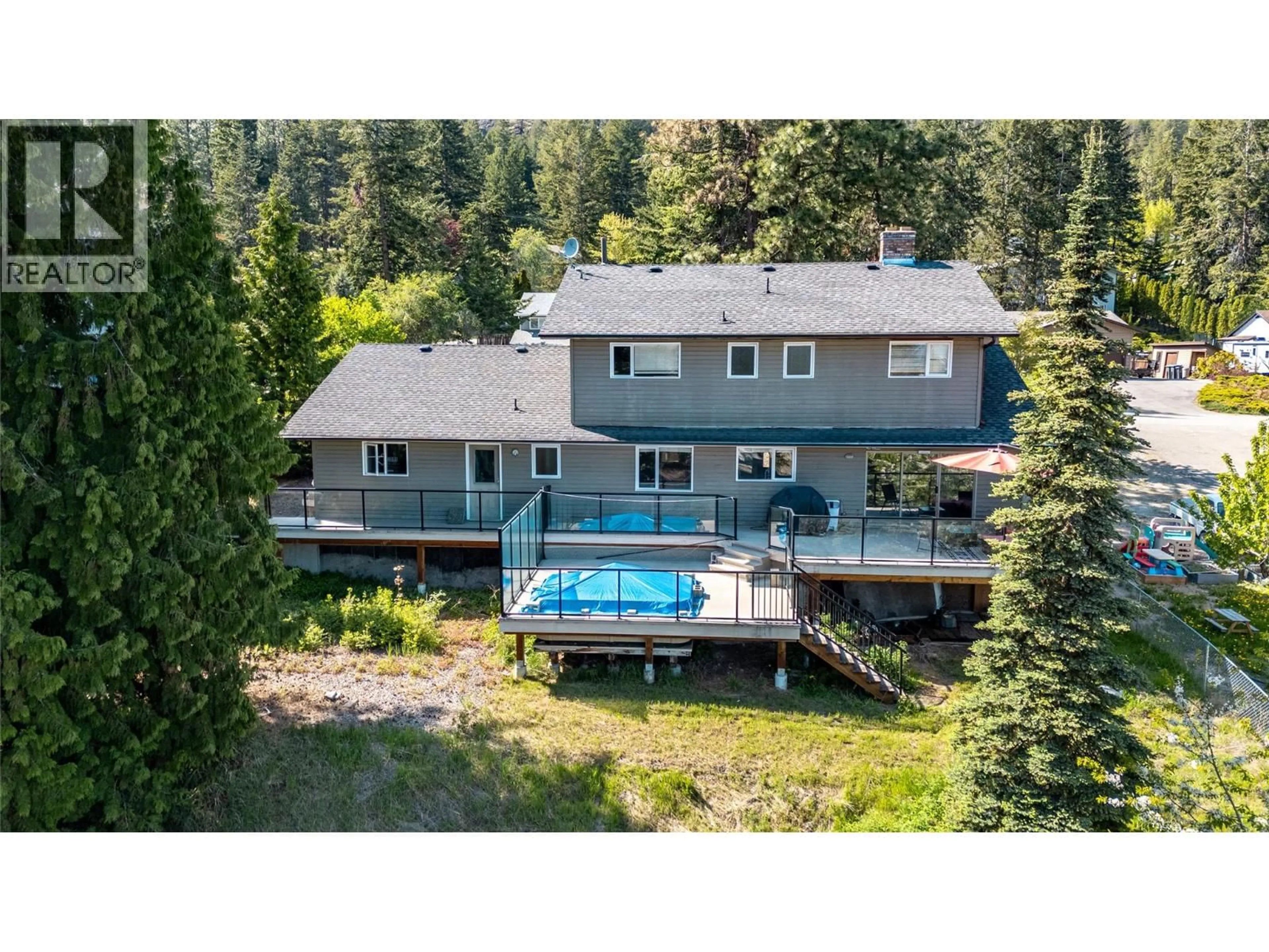 A pic from outside/outdoor area/front of a property/back of a property/a pic from drone, water/lake/river/ocean view for 1623 BLACKWOOD DRIVE, West Kelowna British Columbia V1Z3B7