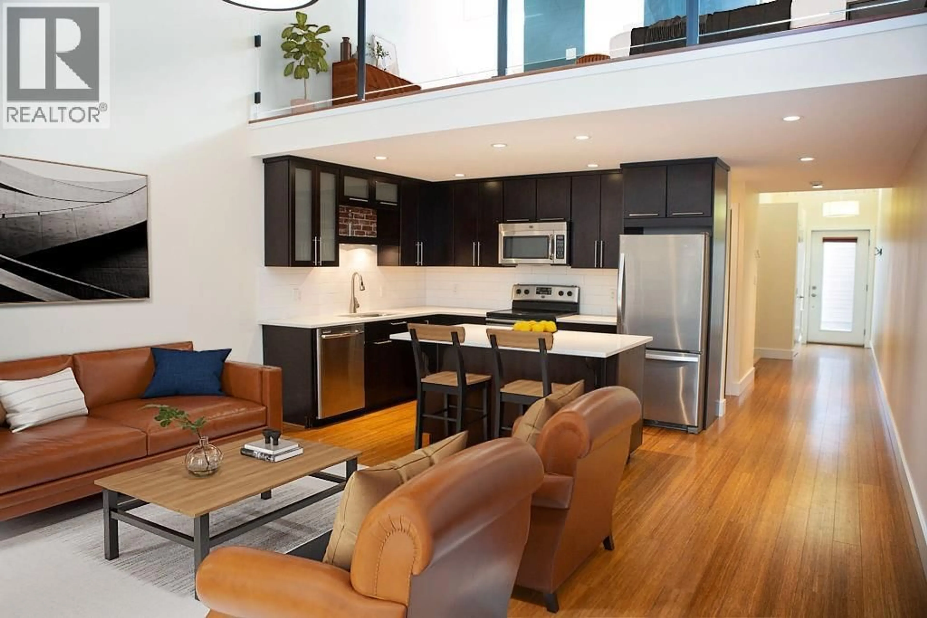 Open concept kitchen, wood/laminate floor for 4 - 702 FOURTH STREET, Nelson British Columbia V1L2S8