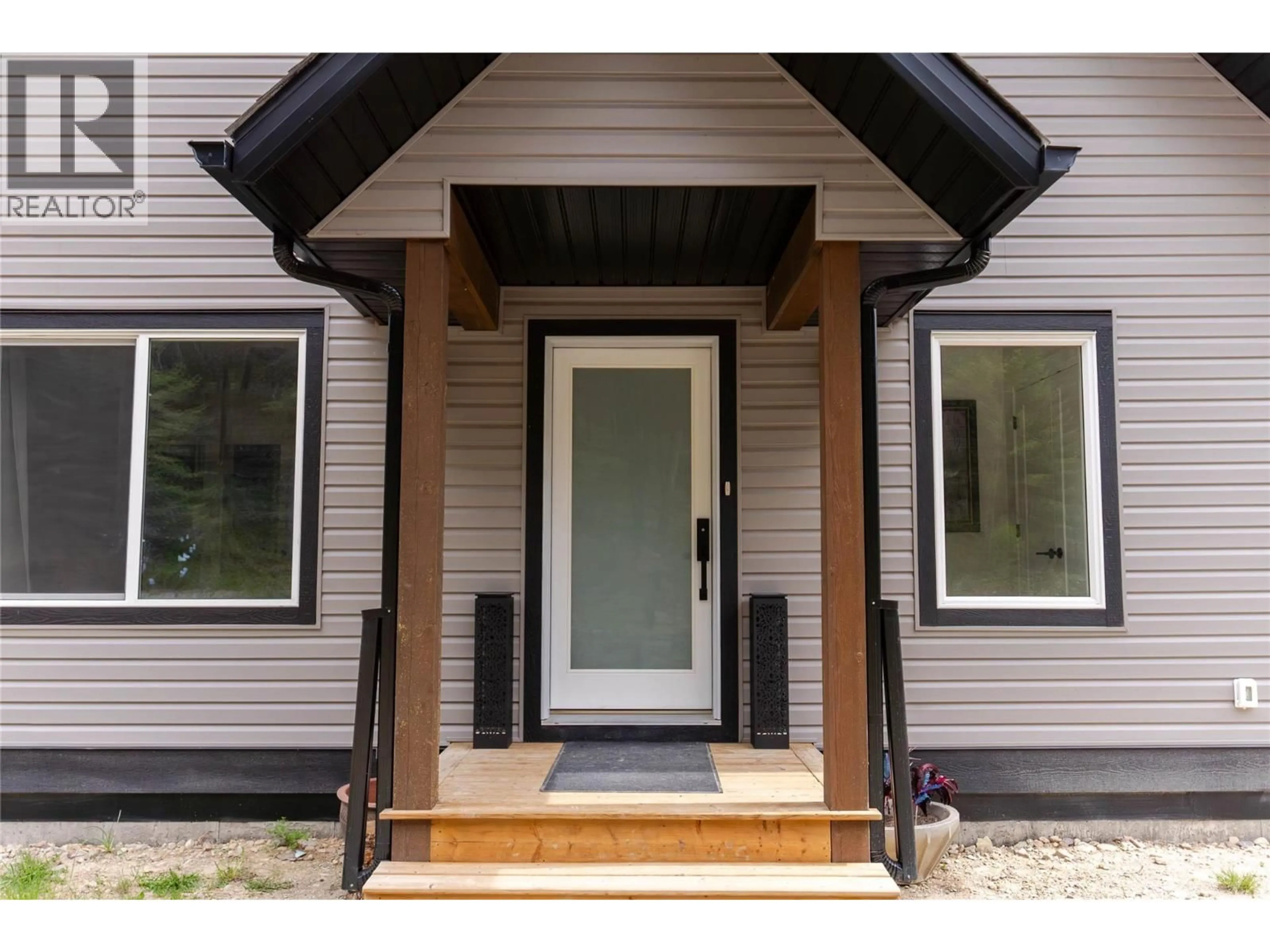 Home with vinyl exterior material, street for 4165 93 HIGHWAY, Grasmere British Columbia V0B1R0