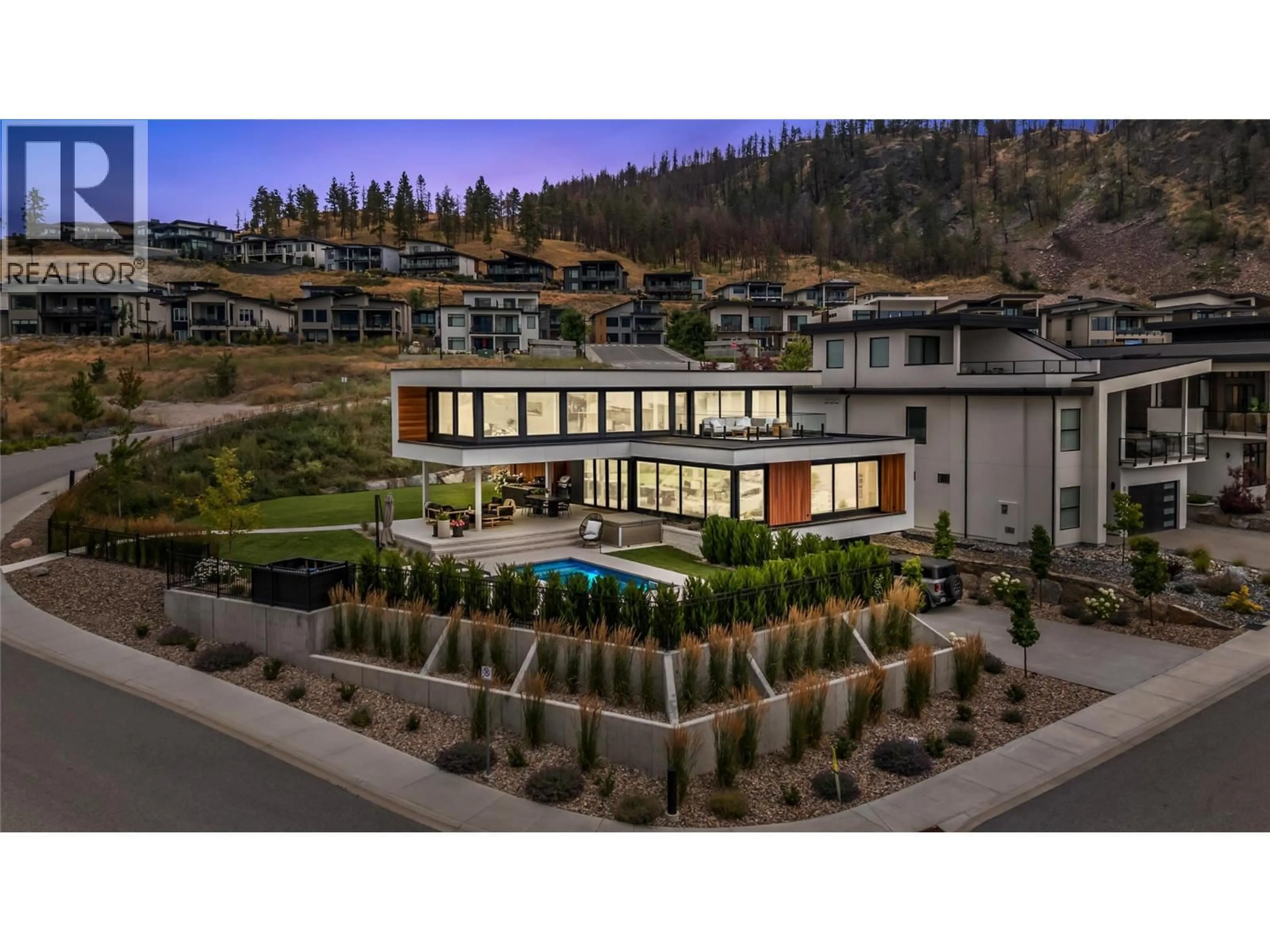 A pic from outside/outdoor area/front of a property/back of a property/a pic from drone, mountain view for 9783 CENTRESTONE DRIVE, Lake Country British Columbia V4V0A5