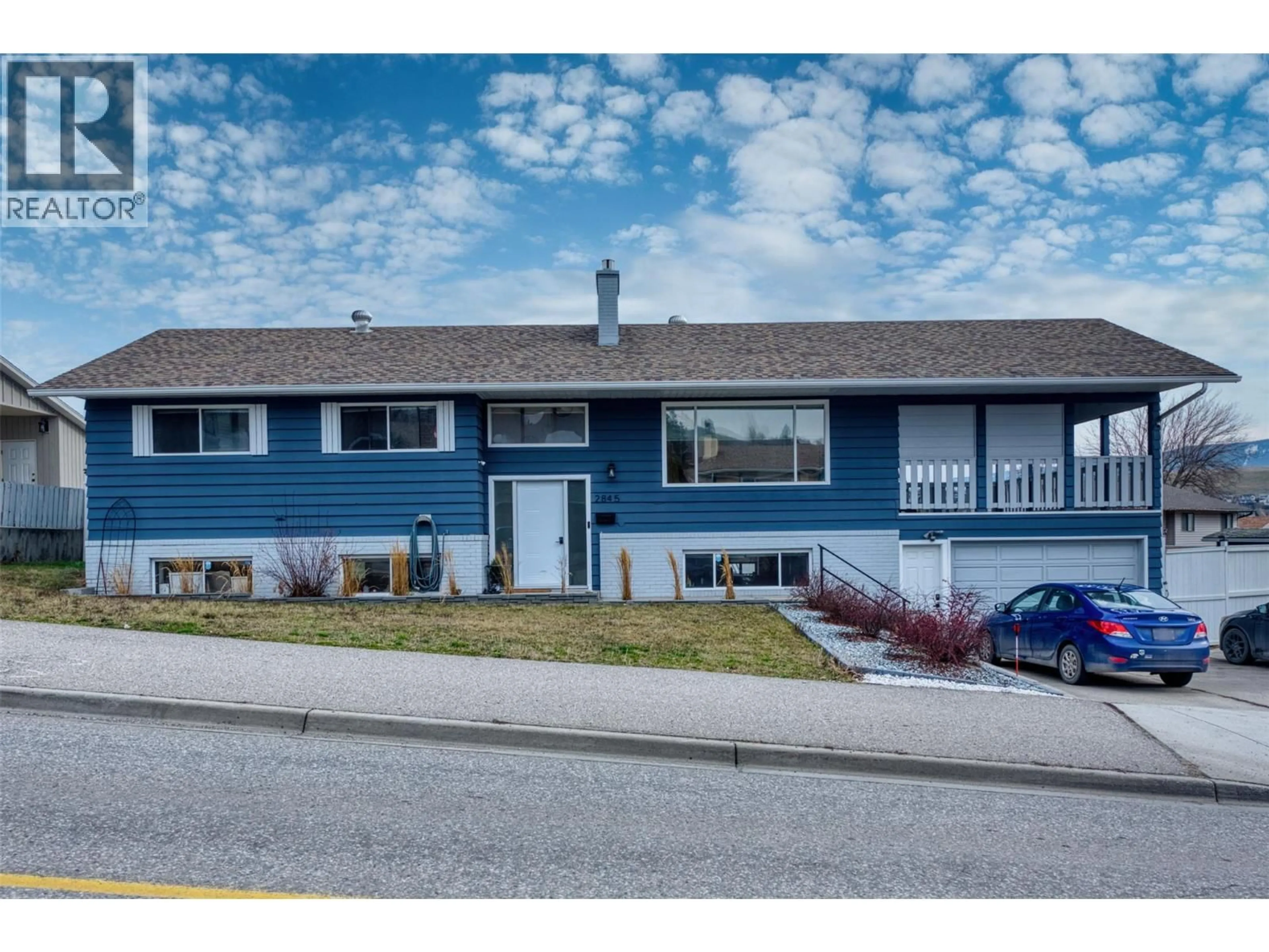 Home with vinyl exterior material, street for 2845 ALLENBY WAY, Vernon British Columbia V1T8R3