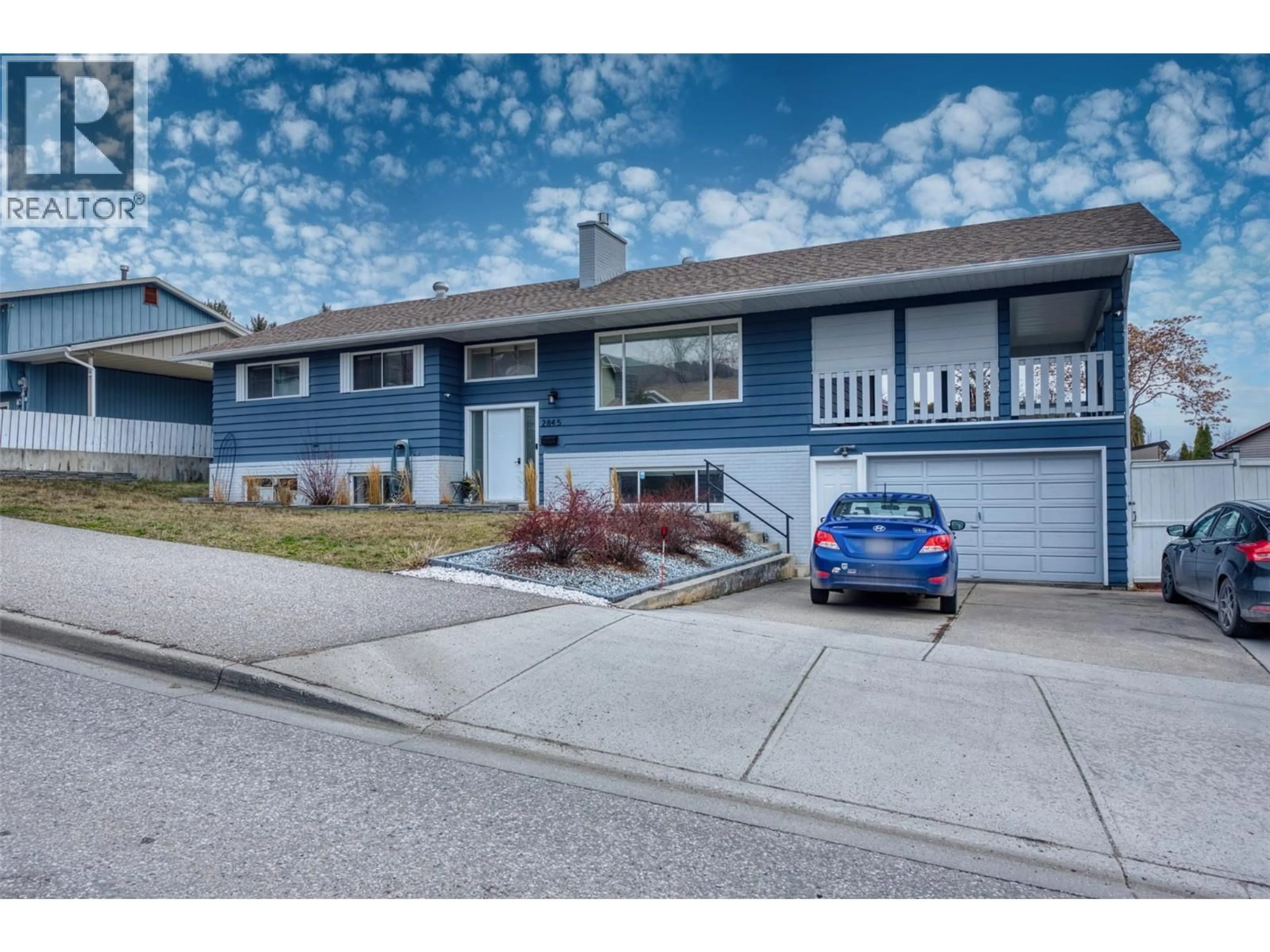 Home with vinyl exterior material, street for 2845 ALLENBY WAY, Vernon British Columbia V1T8R3