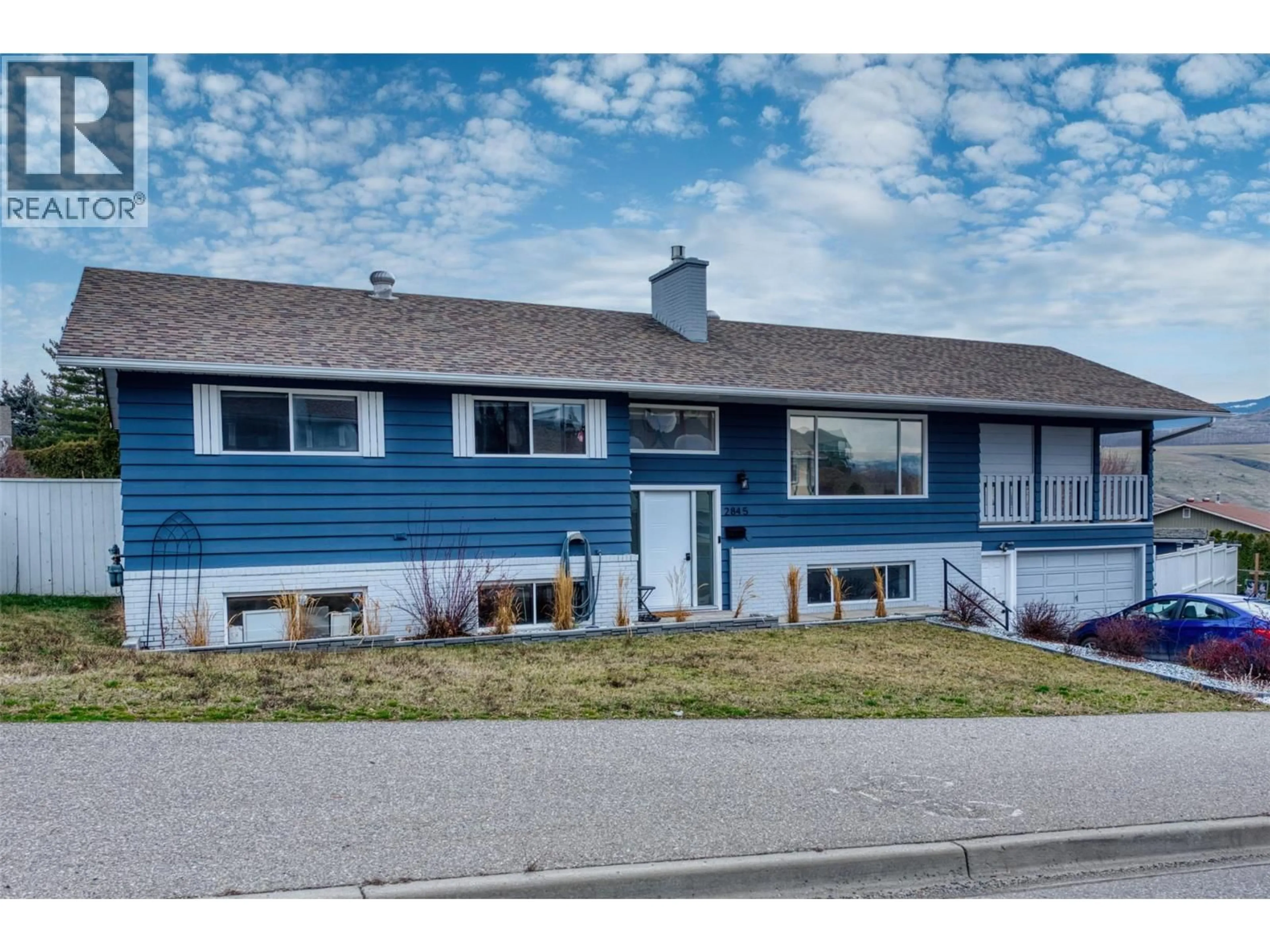 Home with vinyl exterior material, street for 2845 ALLENBY WAY, Vernon British Columbia V1T8R3