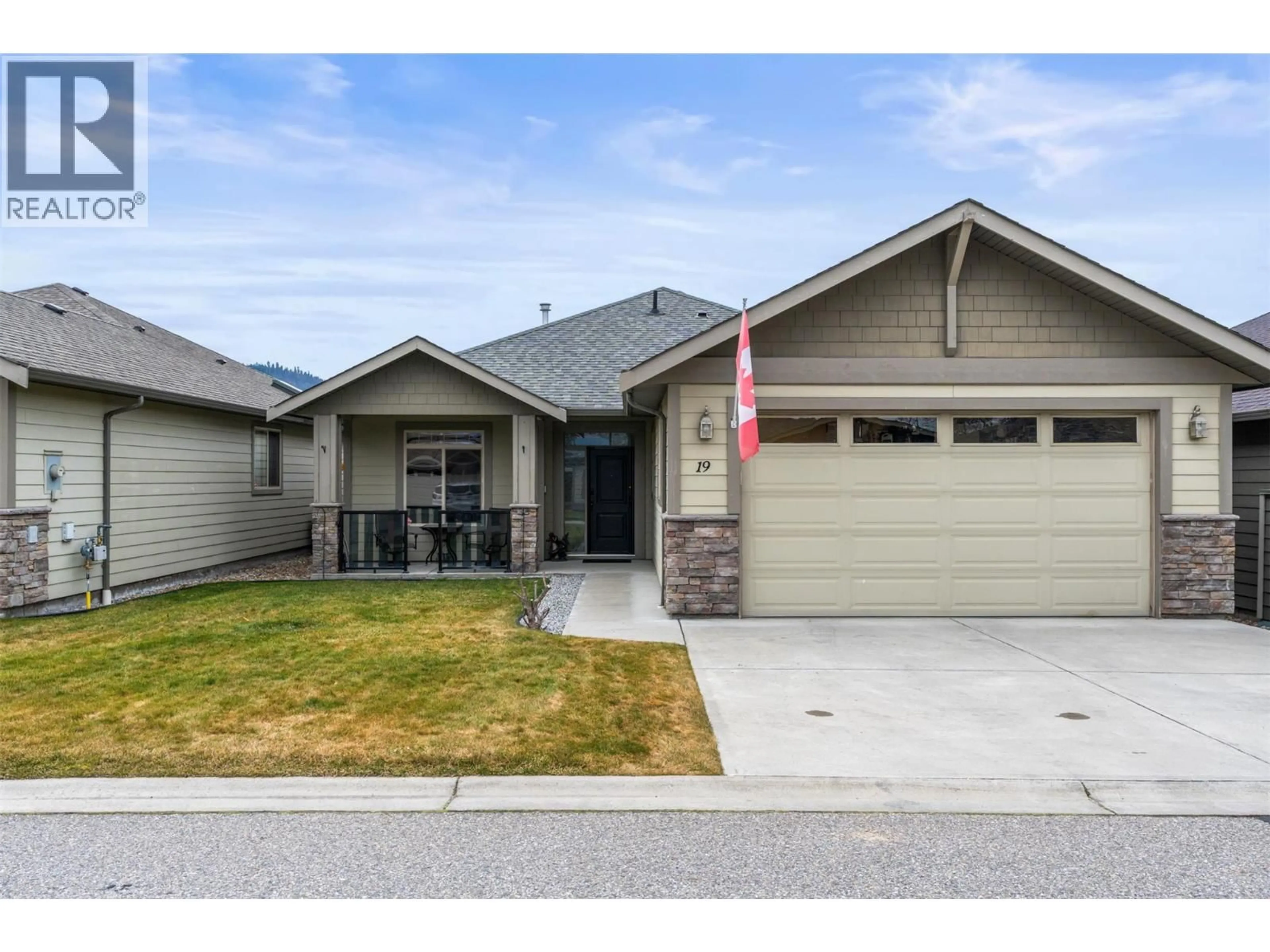 Home with vinyl exterior material, street for 19 - 6450 OKANAGAN LANDING ROAD, Vernon British Columbia V1H2H5