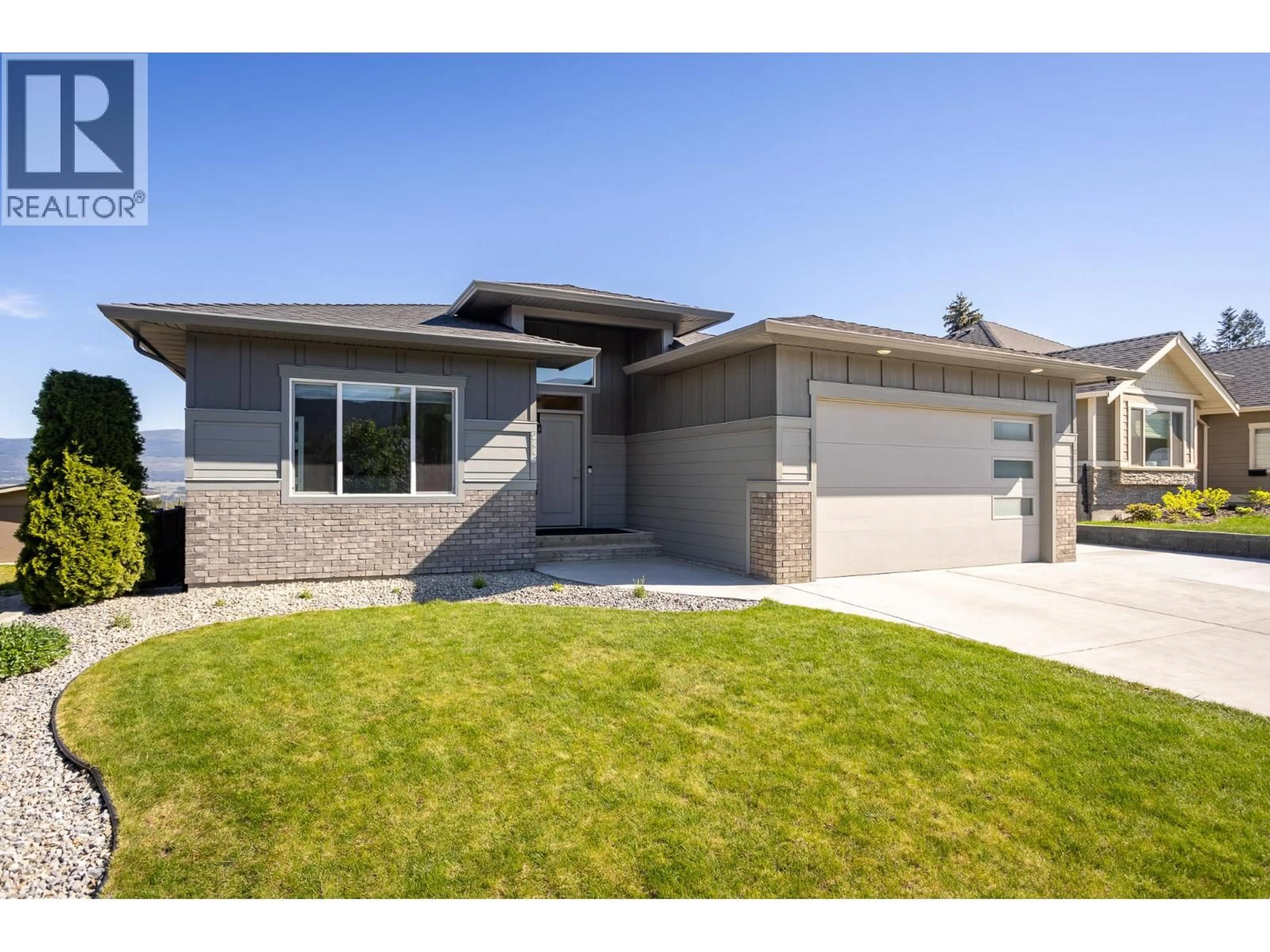 Home with brick exterior material, street for 2449 HARMON ROAD, West Kelowna British Columbia V1Z2C1