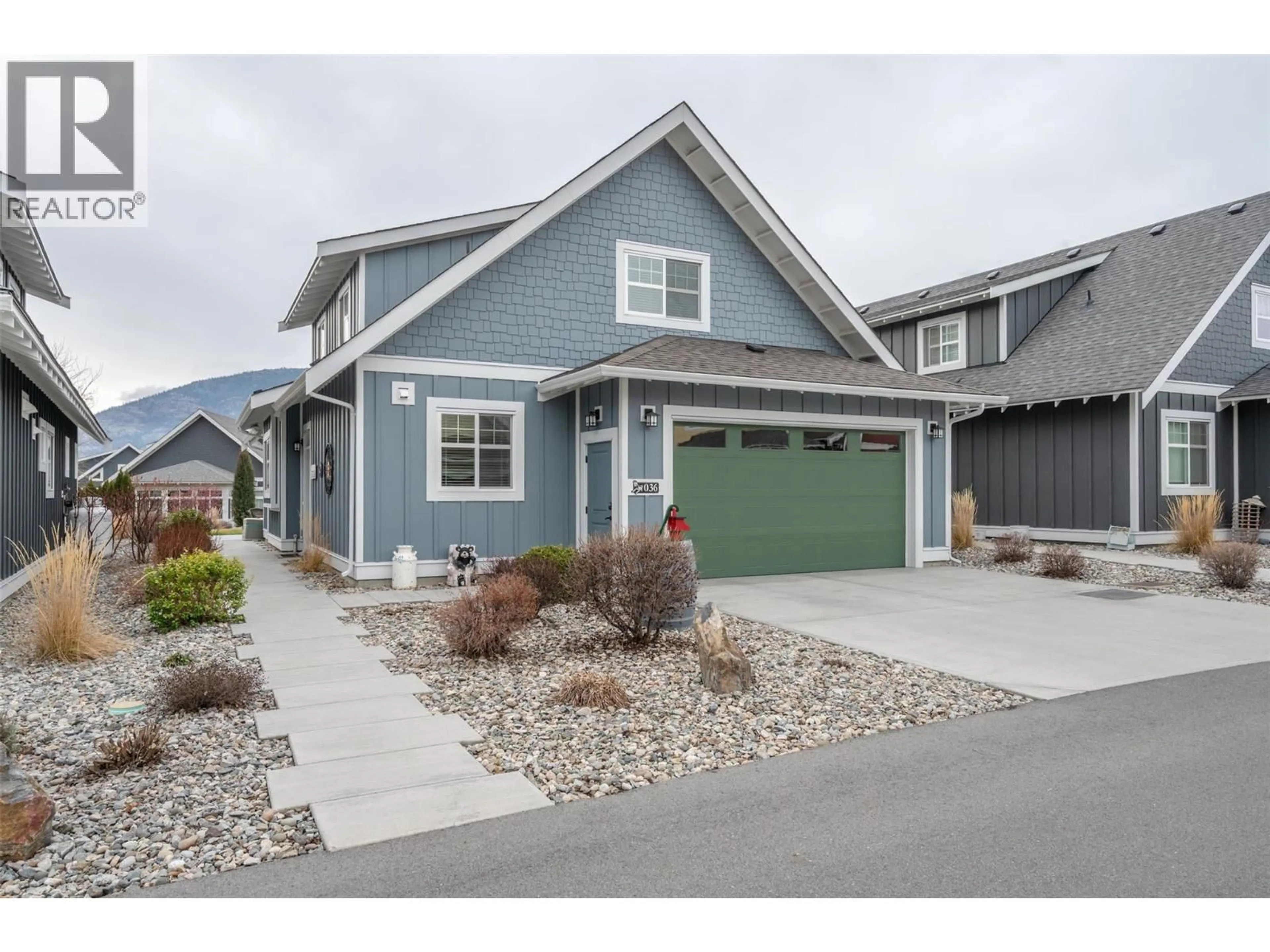 Home with vinyl exterior material, street for 36 - 2450 RADIO TOWER ROAD, Oliver British Columbia V0H1T1