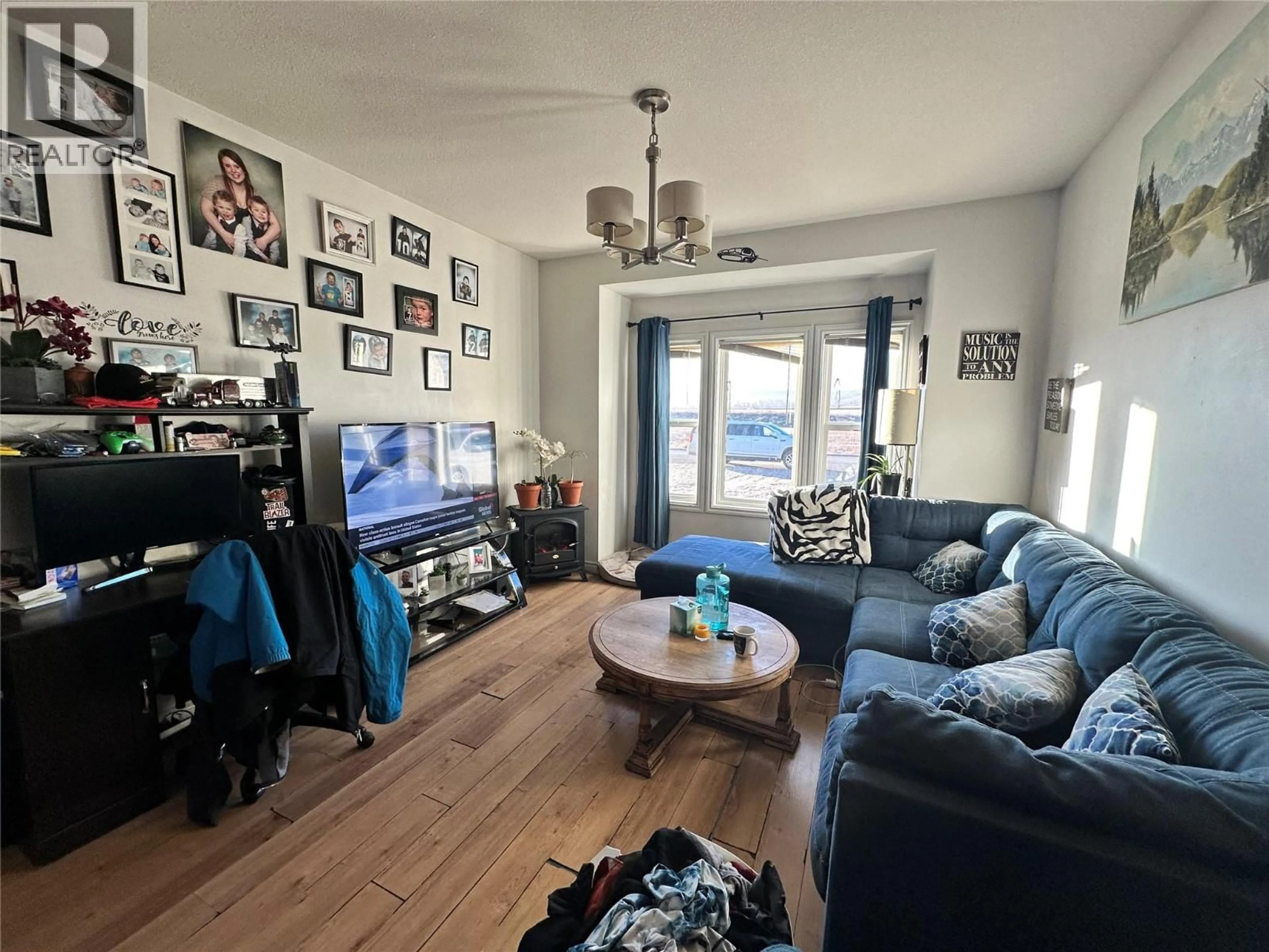 Living room with furniture, unknown for 1544 117 AVENUE, Dawson Creek British Columbia V1G0E7