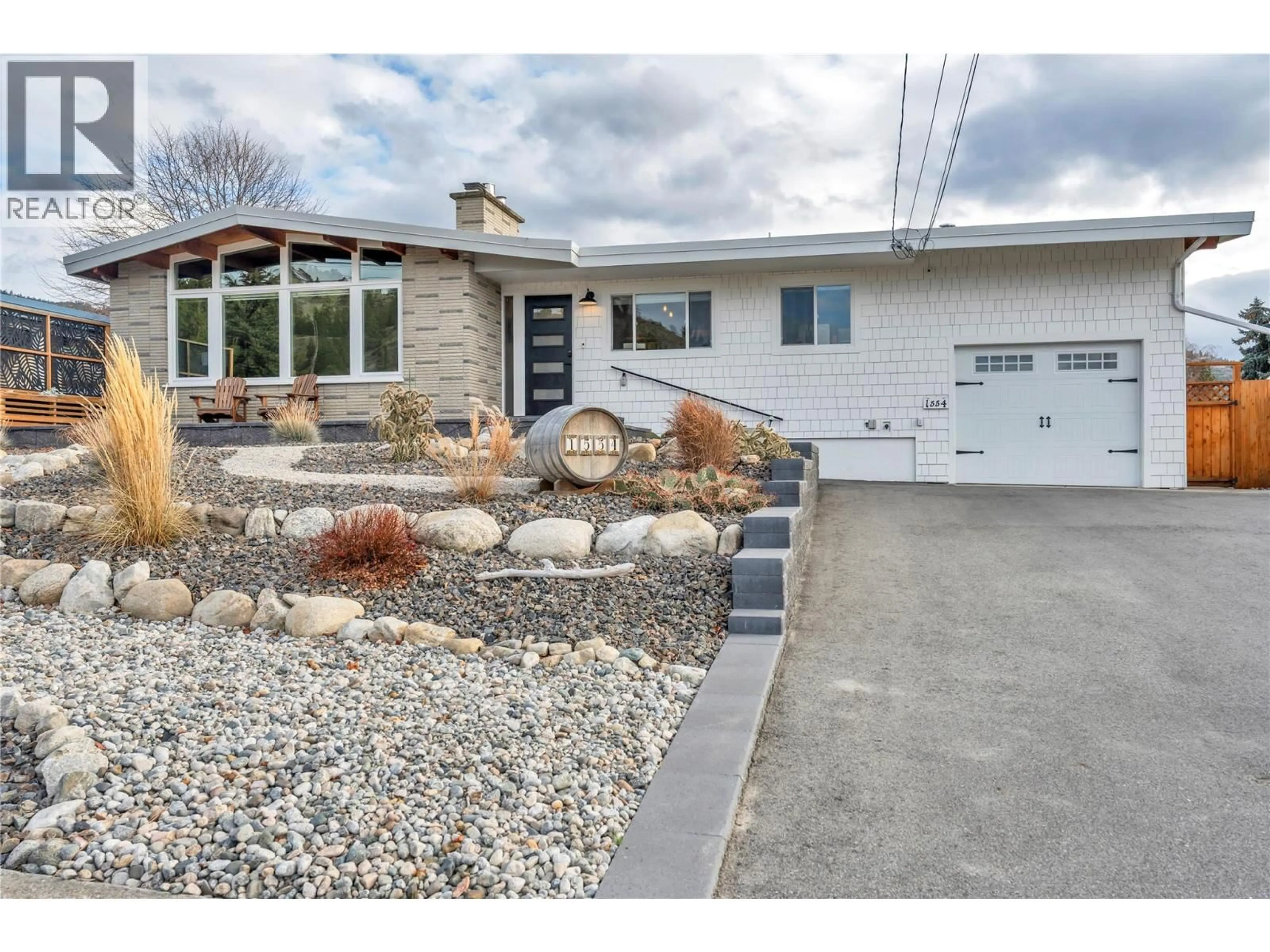 Home with vinyl exterior material, street for 1554 RIDGEDALE AVENUE, Penticton British Columbia V2A2S4
