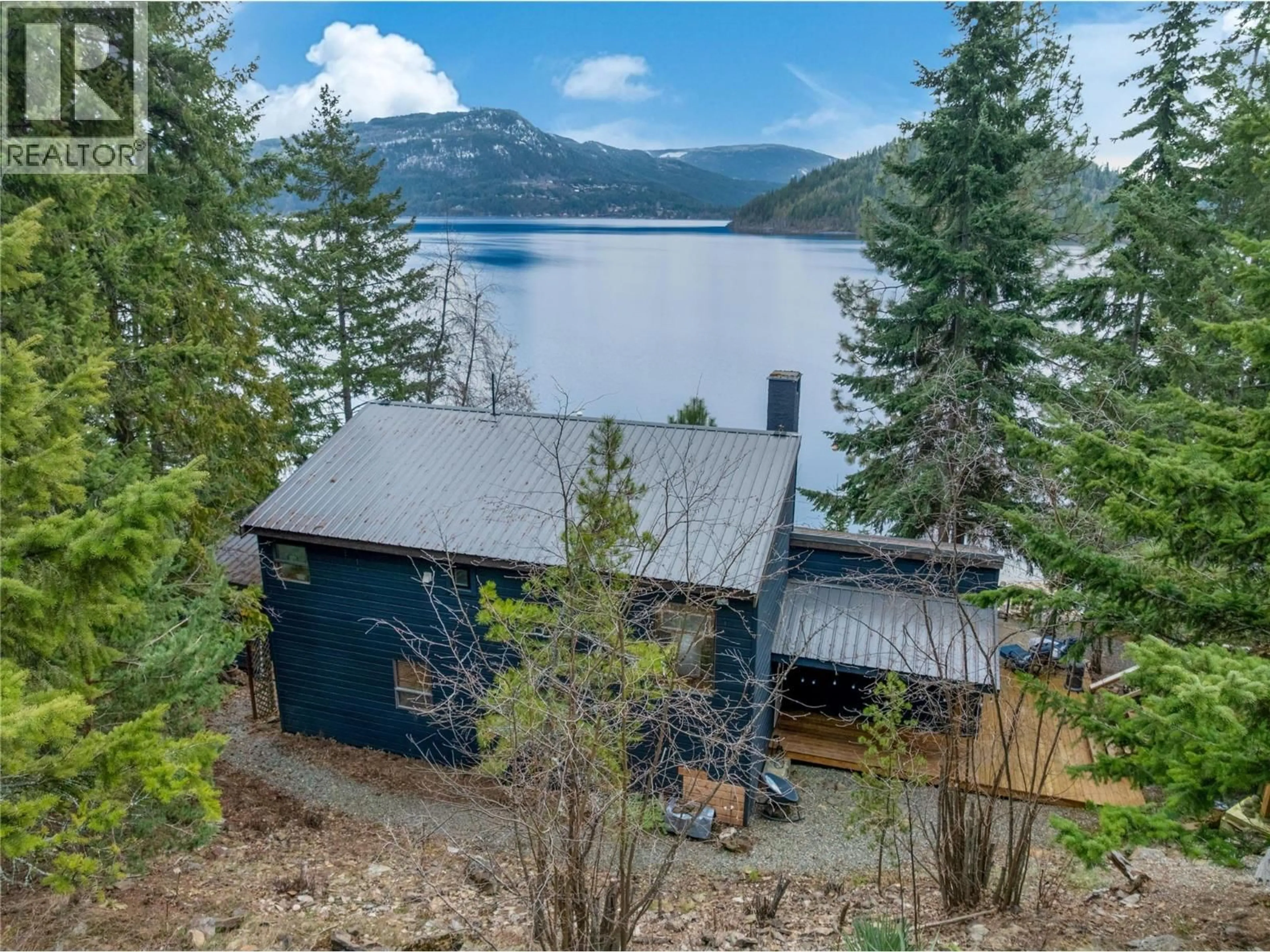 A pic from outside/outdoor area/front of a property/back of a property/a pic from drone, water/lake/river/ocean view for 4378 COPPER COVE ROAD, Scotch Creek British Columbia V0E1M5