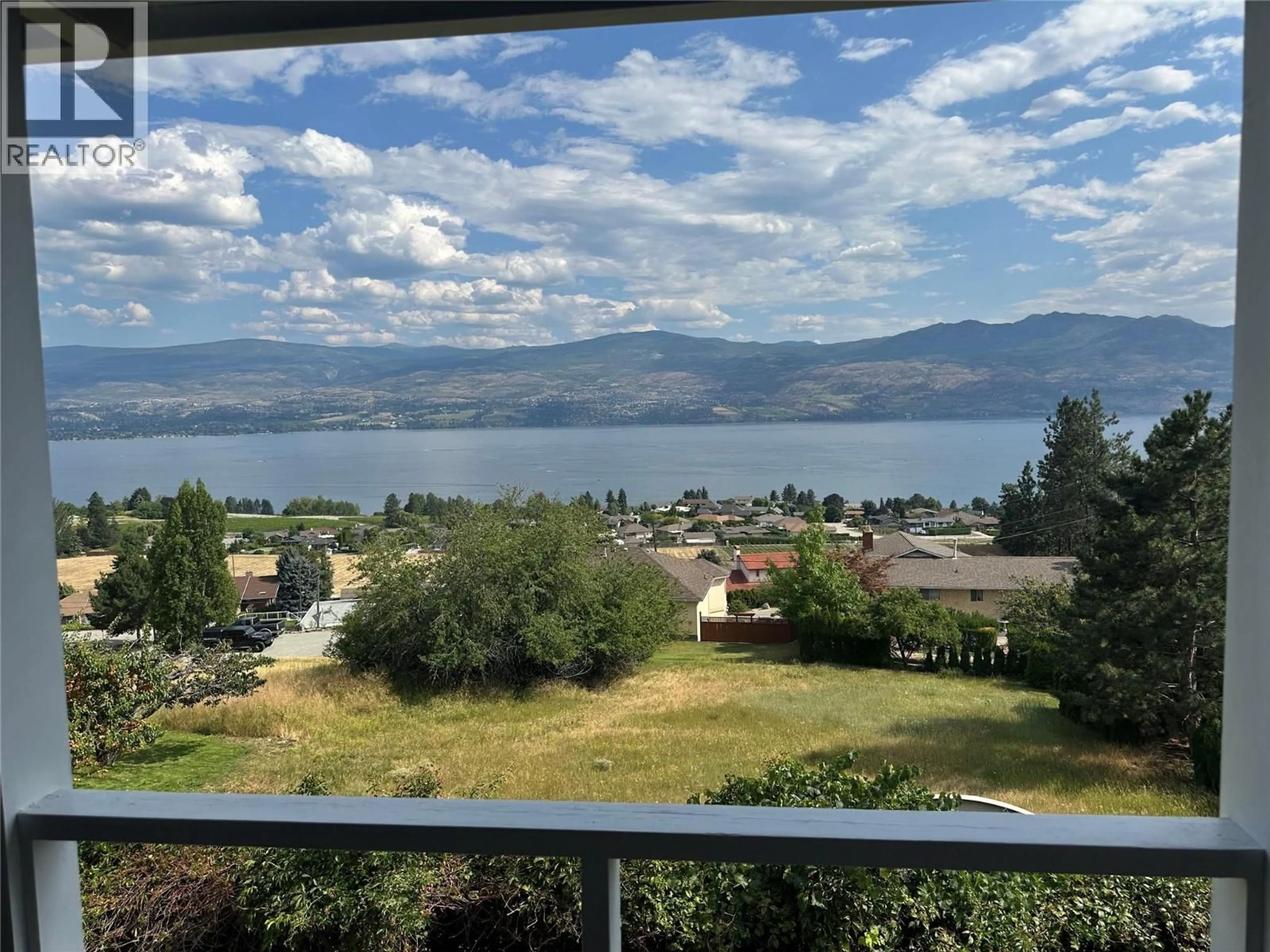 A pic from outside/outdoor area/front of a property/back of a property/a pic from drone, water/lake/river/ocean view for 1163 MENU ROAD, West Kelowna British Columbia V1Z2J6