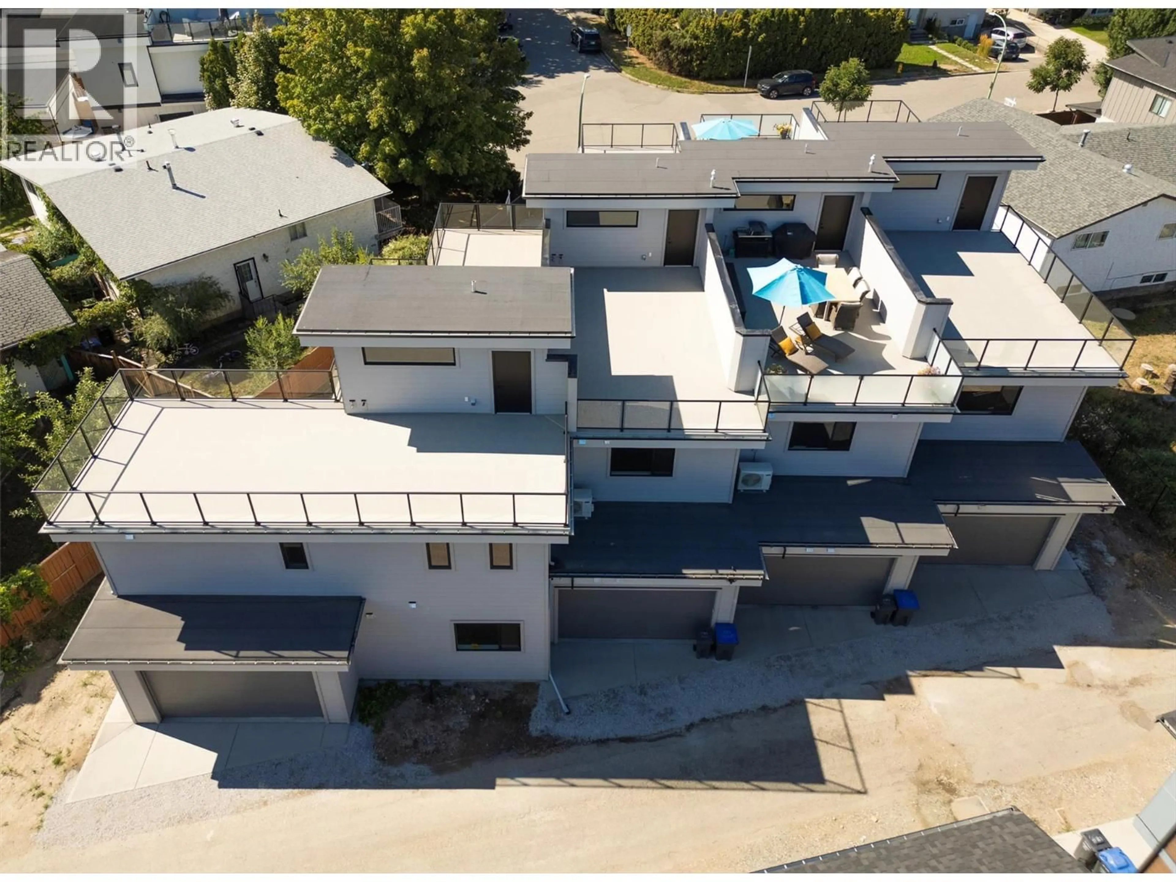 A pic from outside/outdoor area/front of a property/back of a property/a pic from drone, unknown for 4 - 732 COOPLAND CRESCENT, Kelowna British Columbia V1Y2V1