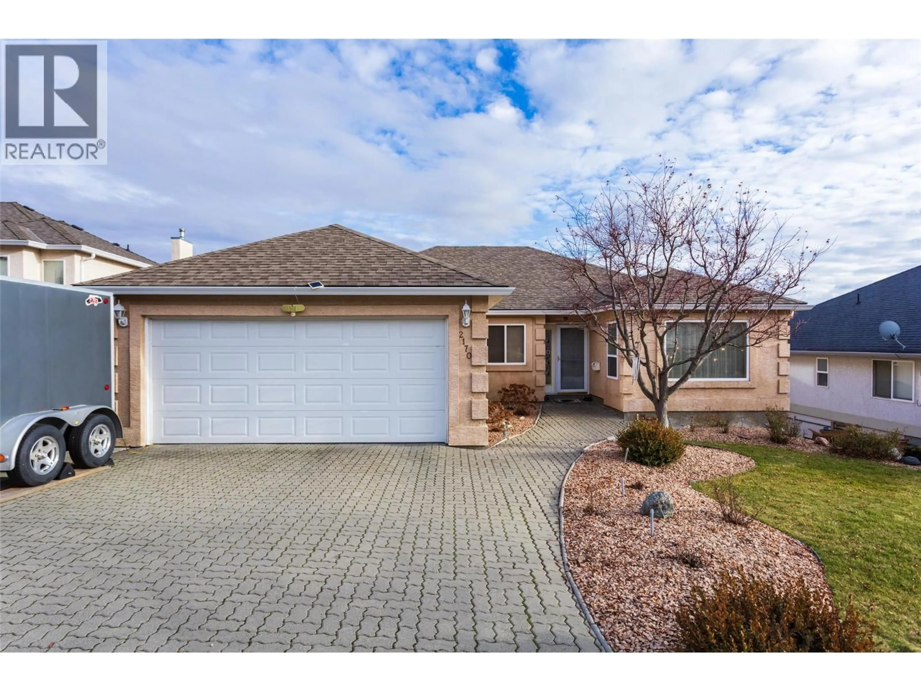 Home with brick exterior material, street for 2170 SUNVIEW DRIVE, West Kelowna British Columbia V1Z3R2