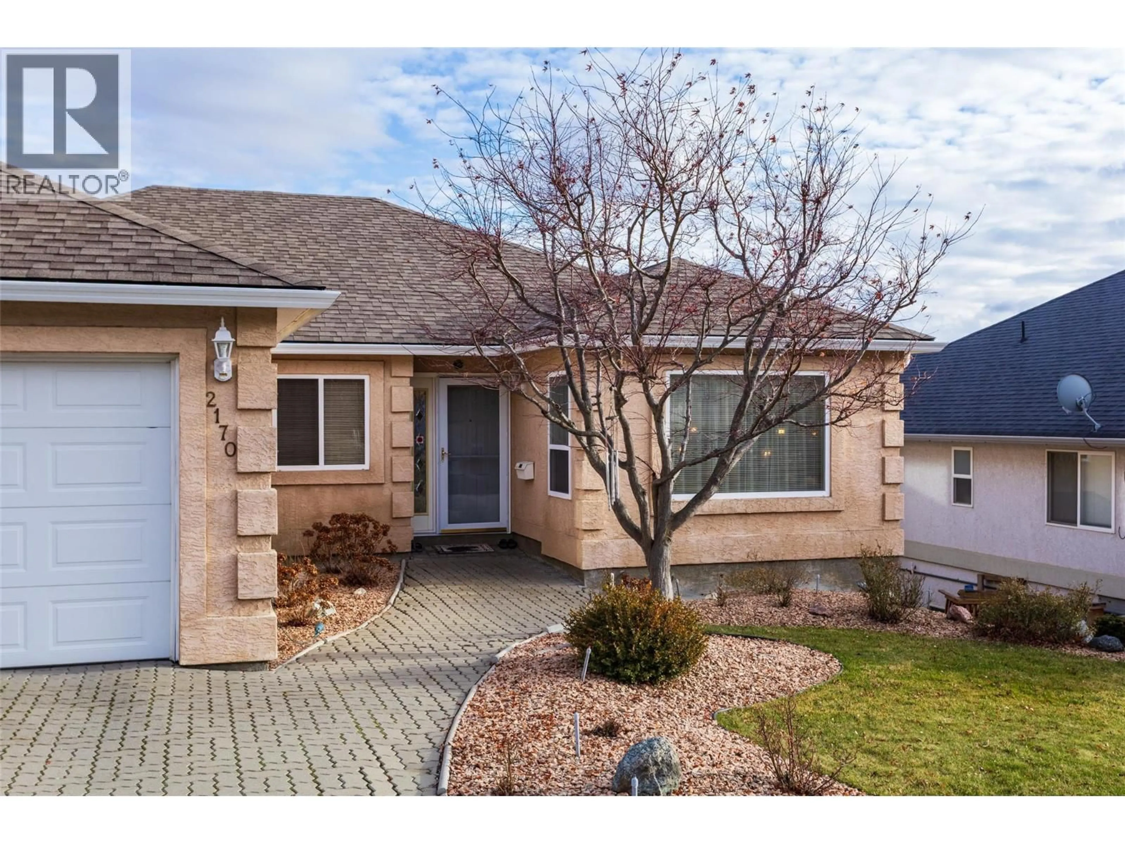 Home with brick exterior material, street for 2170 SUNVIEW DRIVE, West Kelowna British Columbia V1Z3R2