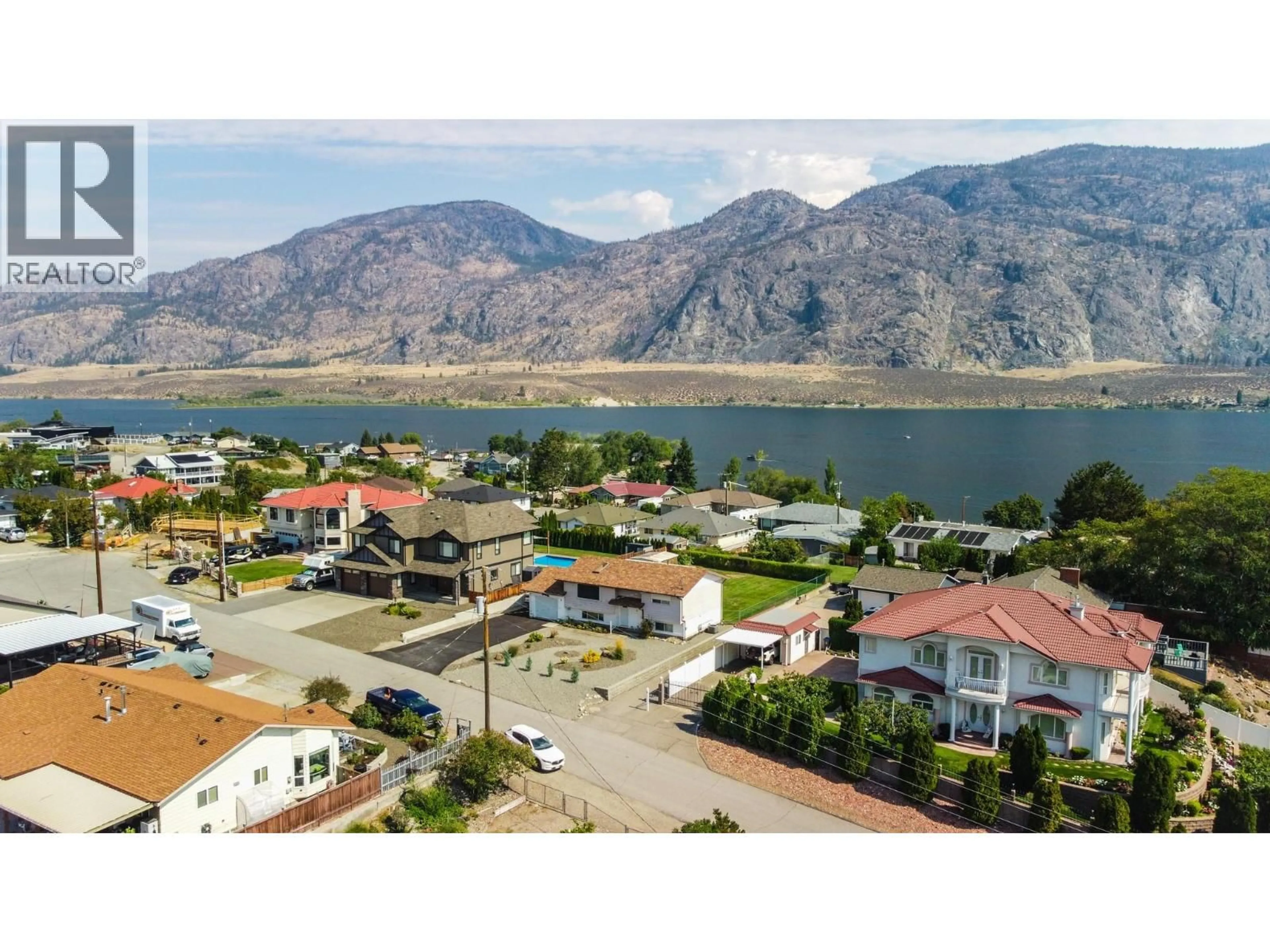 A pic from outside/outdoor area/front of a property/back of a property/a pic from drone, mountain view for 5 MCINTOSH COURT, Osoyoos British Columbia V0H1V2