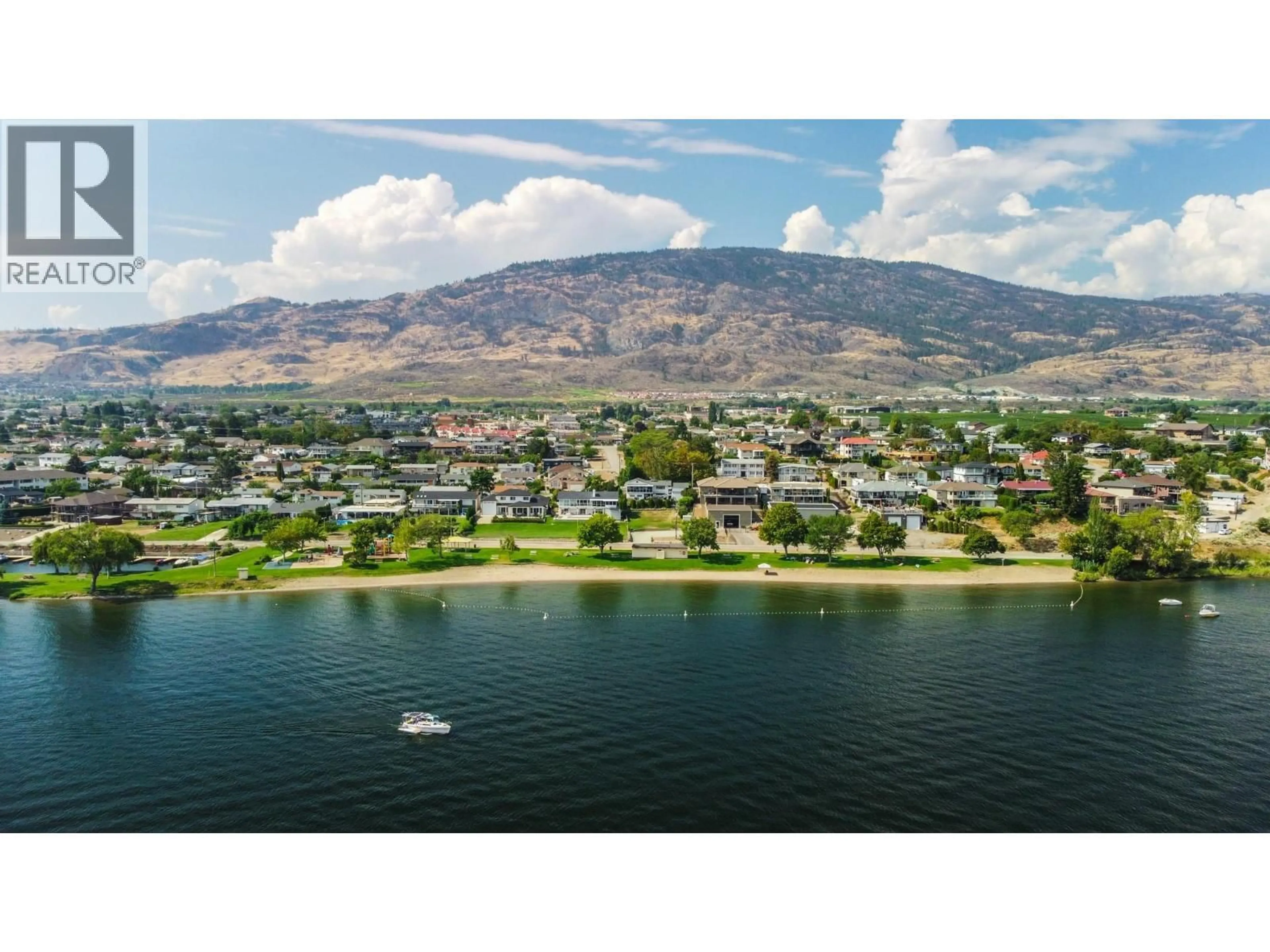 A pic from outside/outdoor area/front of a property/back of a property/a pic from drone, water/lake/river/ocean view for 5 MCINTOSH COURT, Osoyoos British Columbia V0H1V2