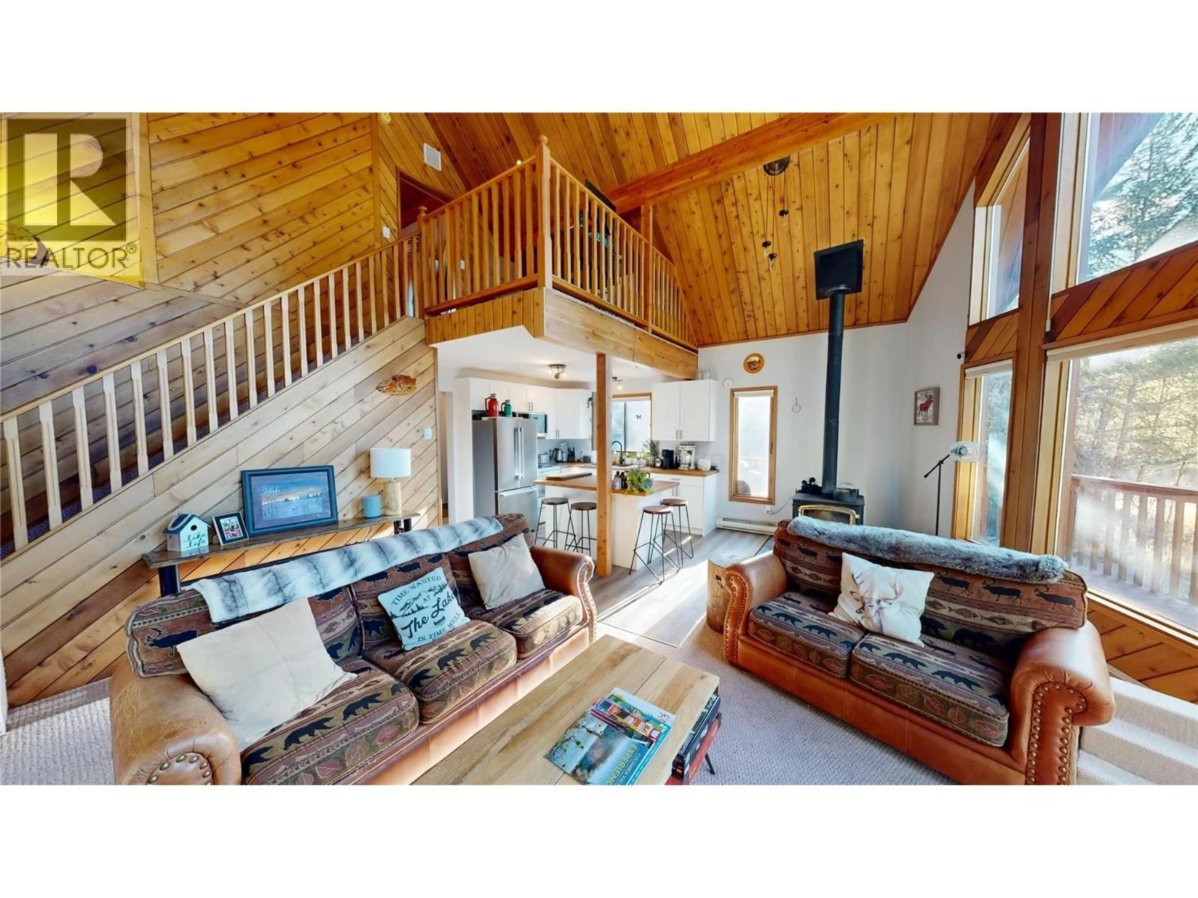 Living room with furniture, wood/laminate floor for 1086 SCENIC PLACE, Windermere British Columbia V0B2L1