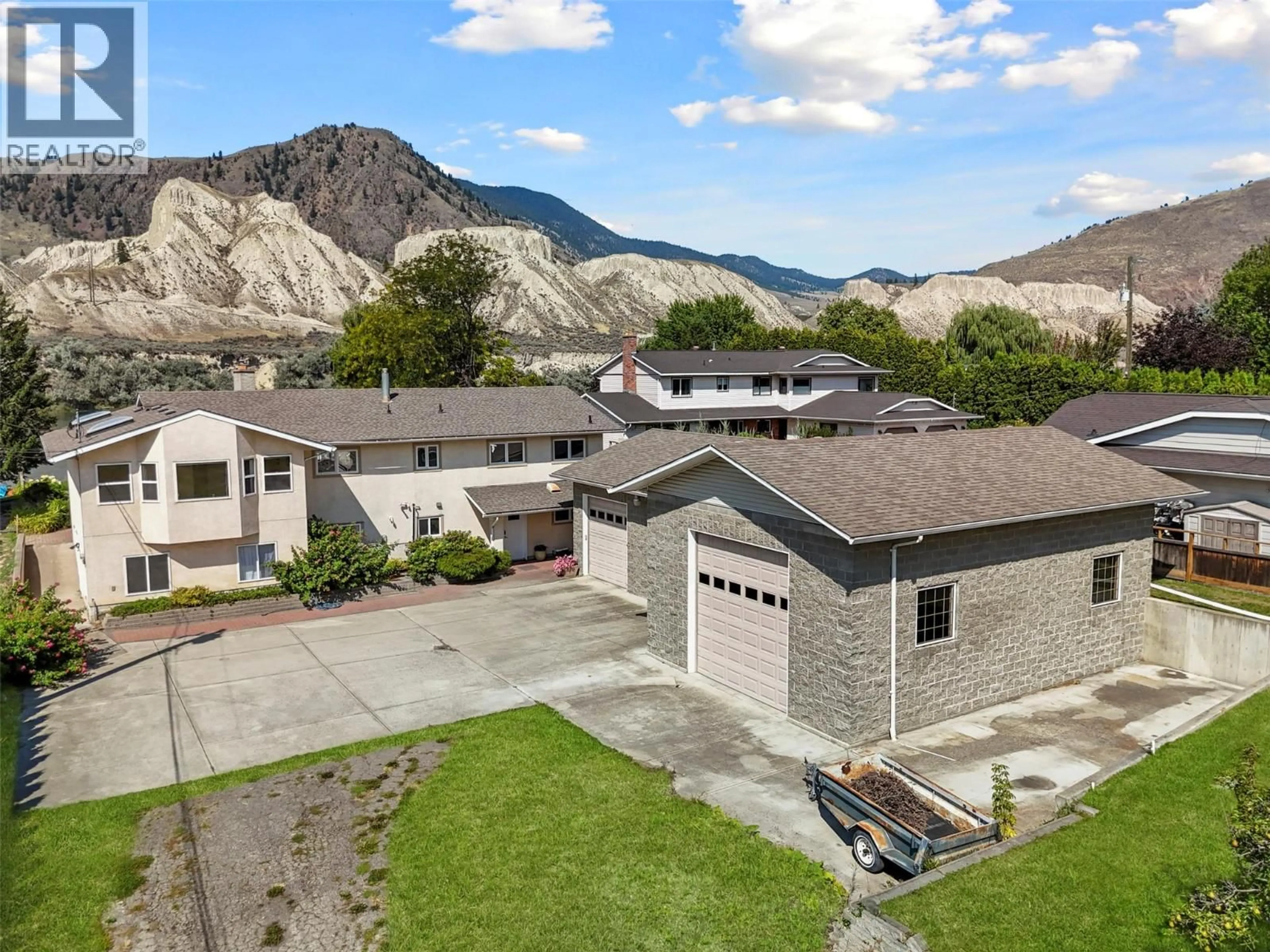 A pic from outside/outdoor area/front of a property/back of a property/a pic from drone, mountain view for 6066 FURRER ROAD, Kamloops British Columbia V2C4V4