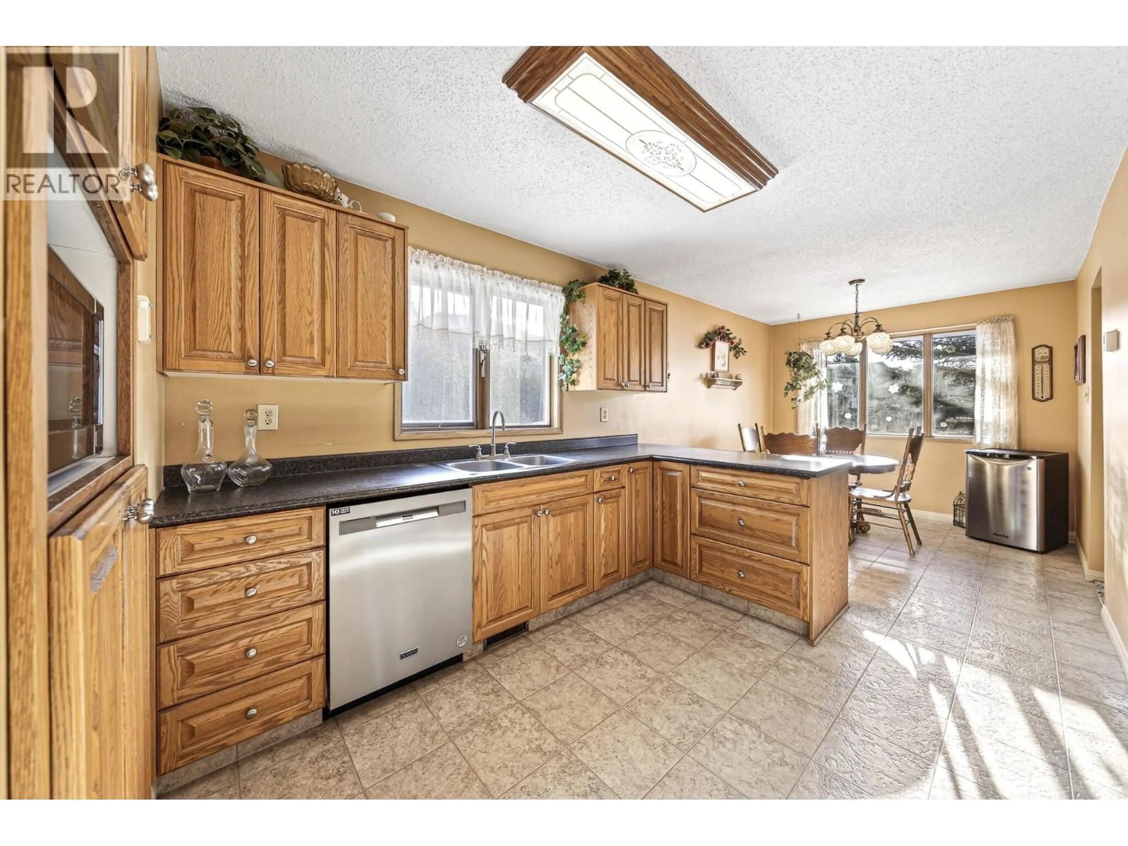 Open concept kitchen, ceramic/tile floor for 1329 CYPRESS DRIVE, Sparwood British Columbia V0B2G2