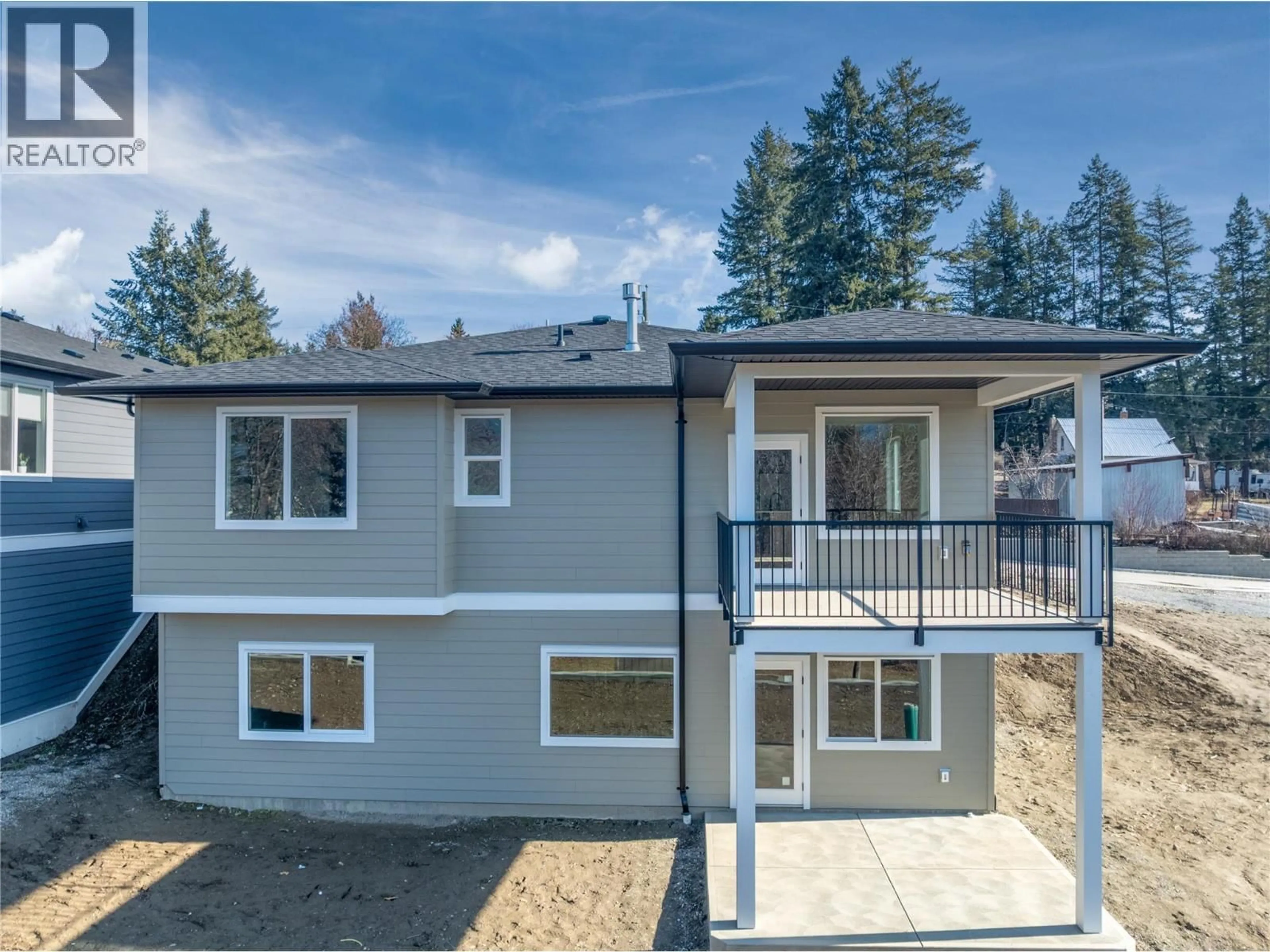A pic from outside/outdoor area/front of a property/back of a property/a pic from drone, street for 2951 27 STREET NORTHEAST, Salmon Arm British Columbia V1E2Z7