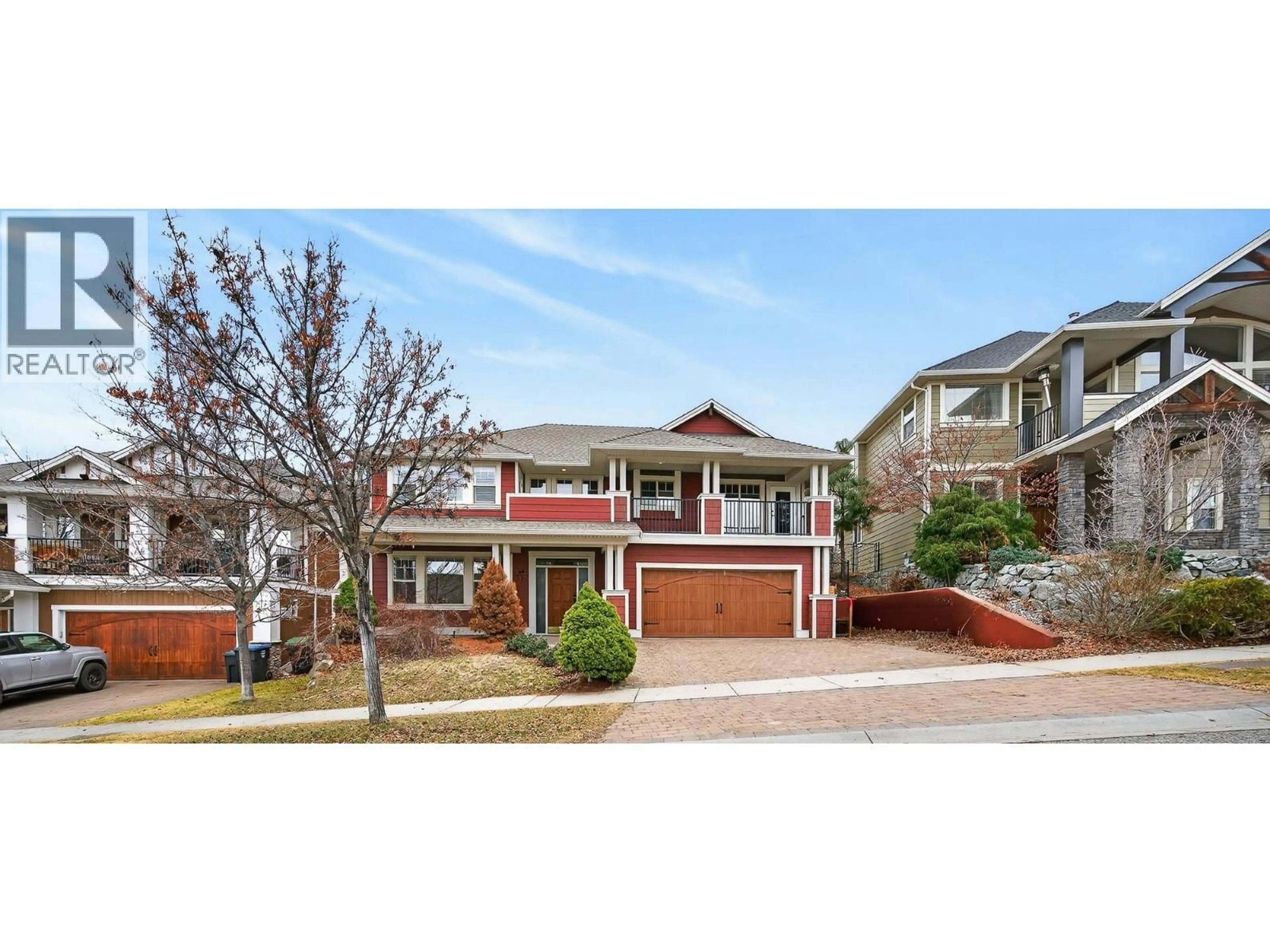 Home with brick exterior material, street for 327 QUILCHENA DRIVE, Kelowna British Columbia V1W4Y9