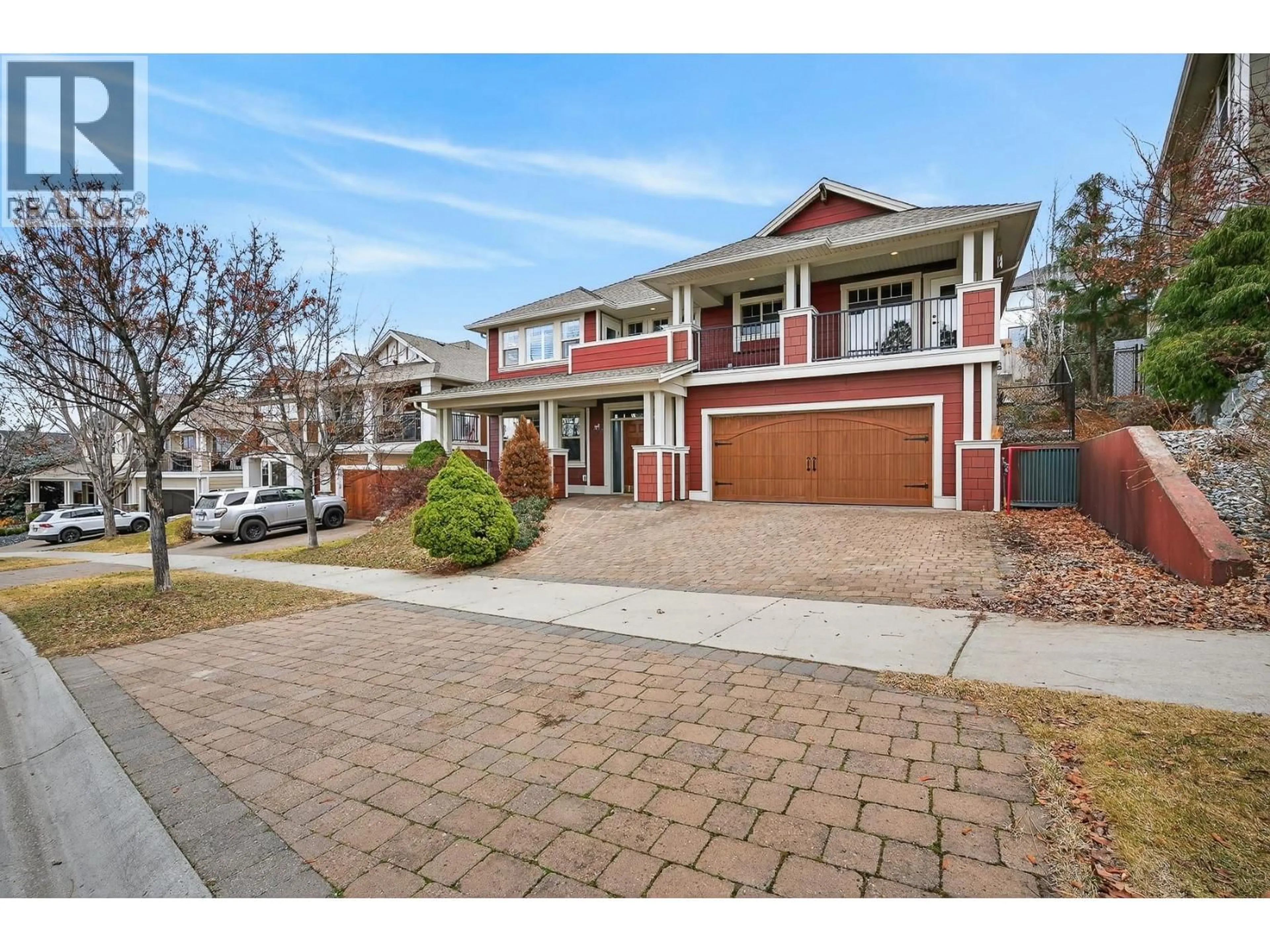 Home with brick exterior material, street for 327 QUILCHENA DRIVE, Kelowna British Columbia V1W4Y9