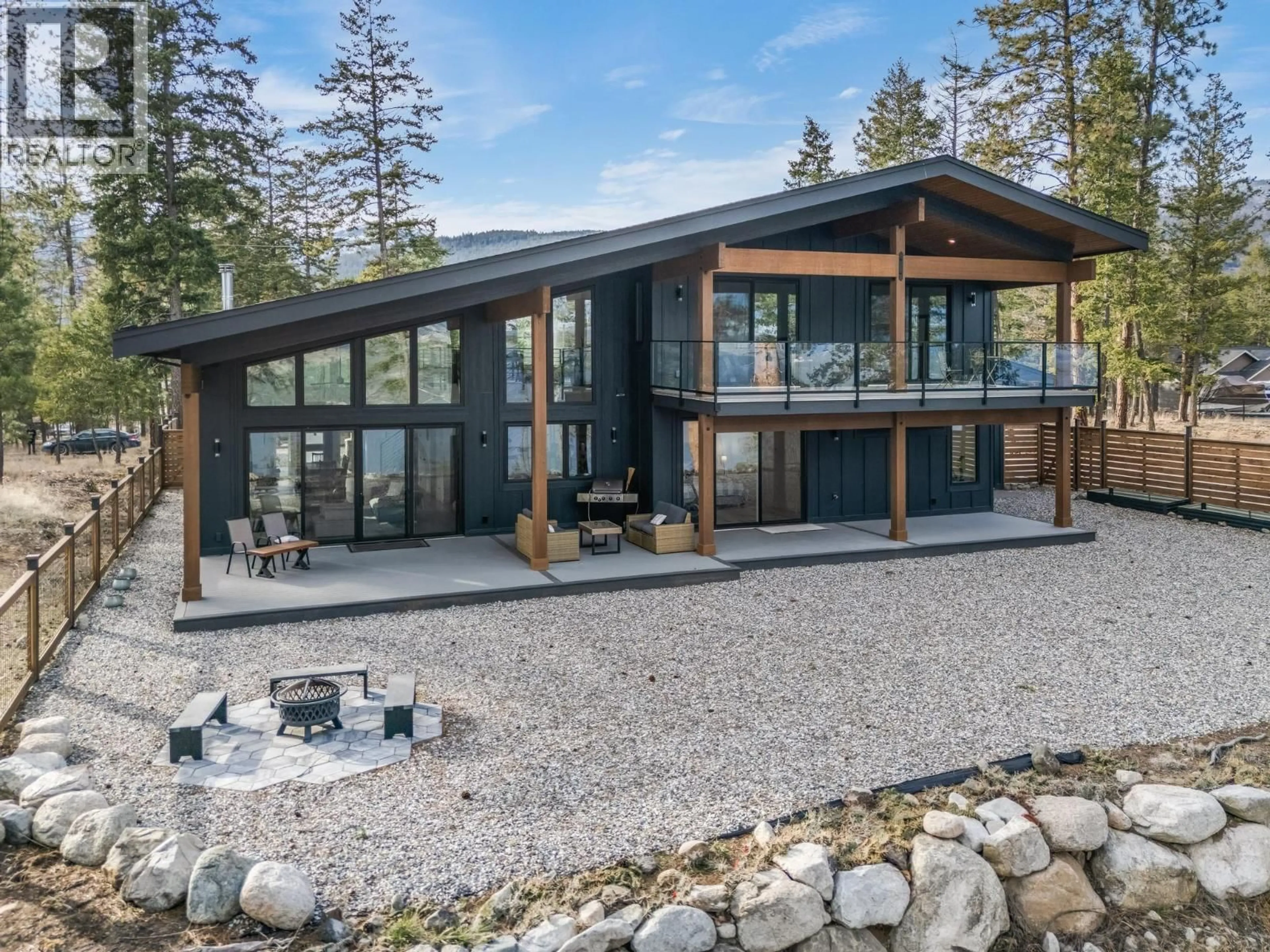 Home with vinyl exterior material, unknown for 7235 DUNWATERS ROAD, Kelowna British Columbia V1Z3W4