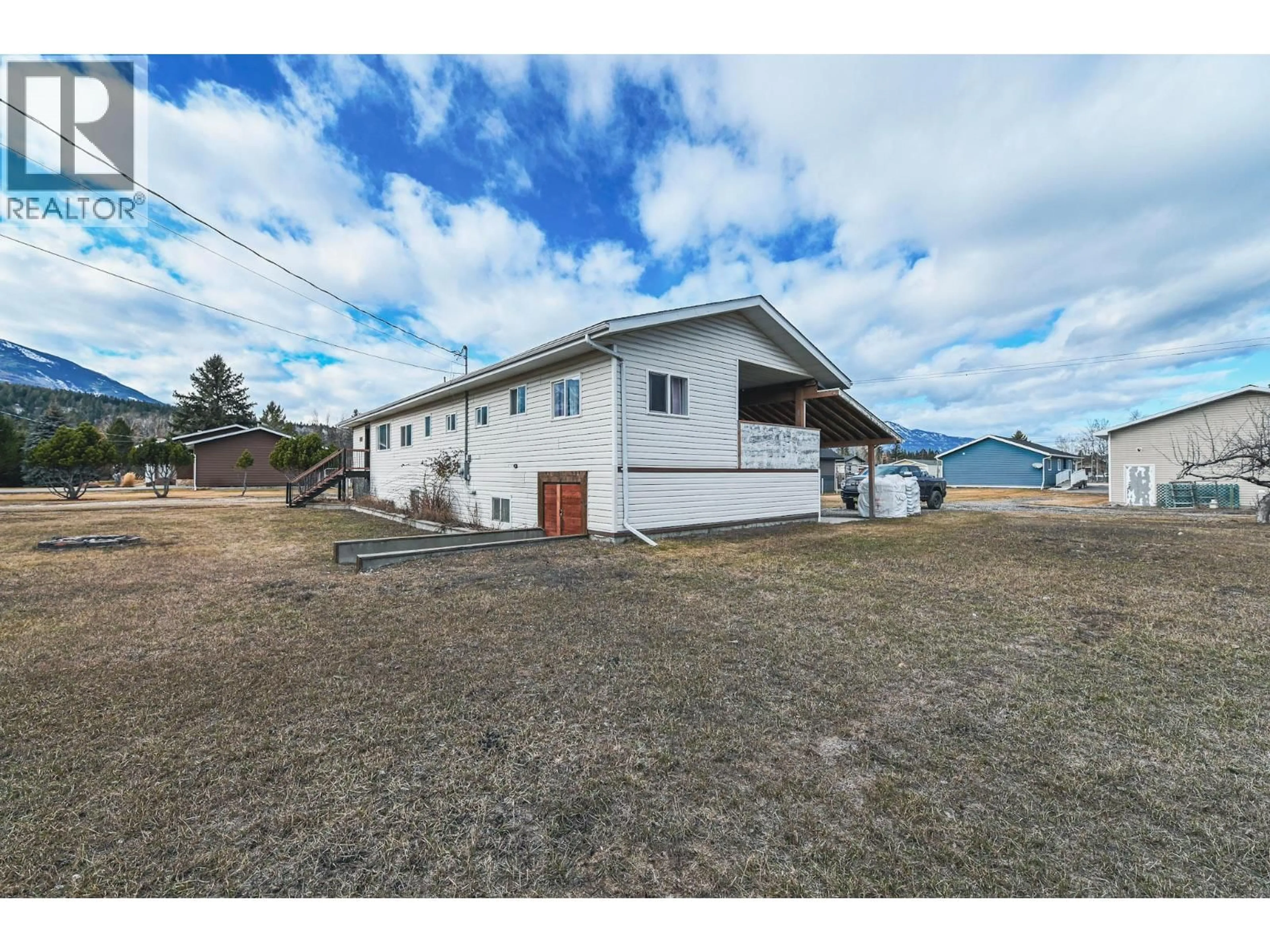 A pic from outside/outdoor area/front of a property/back of a property/a pic from drone, unknown for 4771 BAILLIE GROHMAN AVENUE, Canal Flats British Columbia v0b1b0