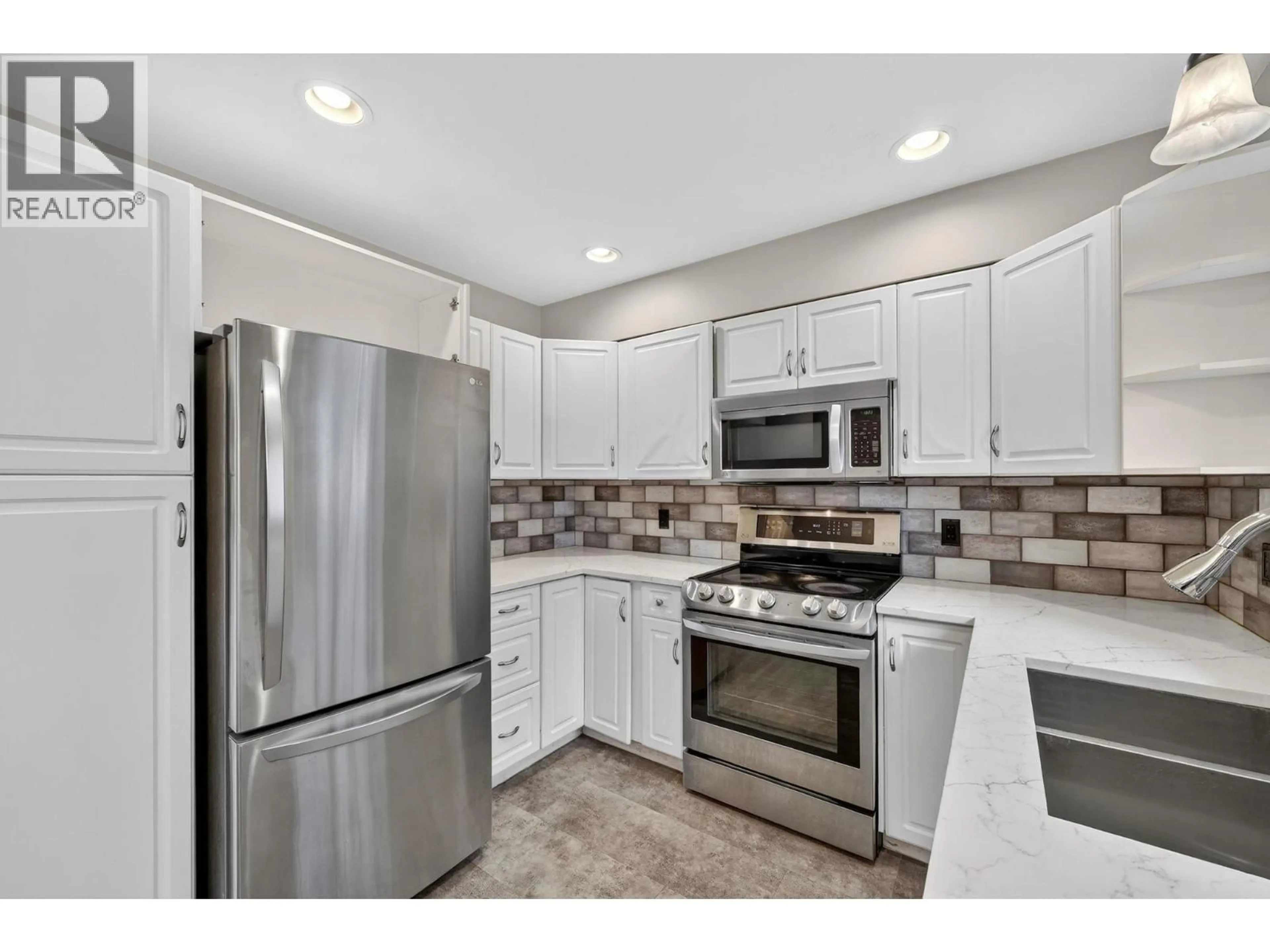 Standard kitchen, ceramic/tile floor for 27 - 124 MILLS ROAD, Kelowna British Columbia V1X4G7