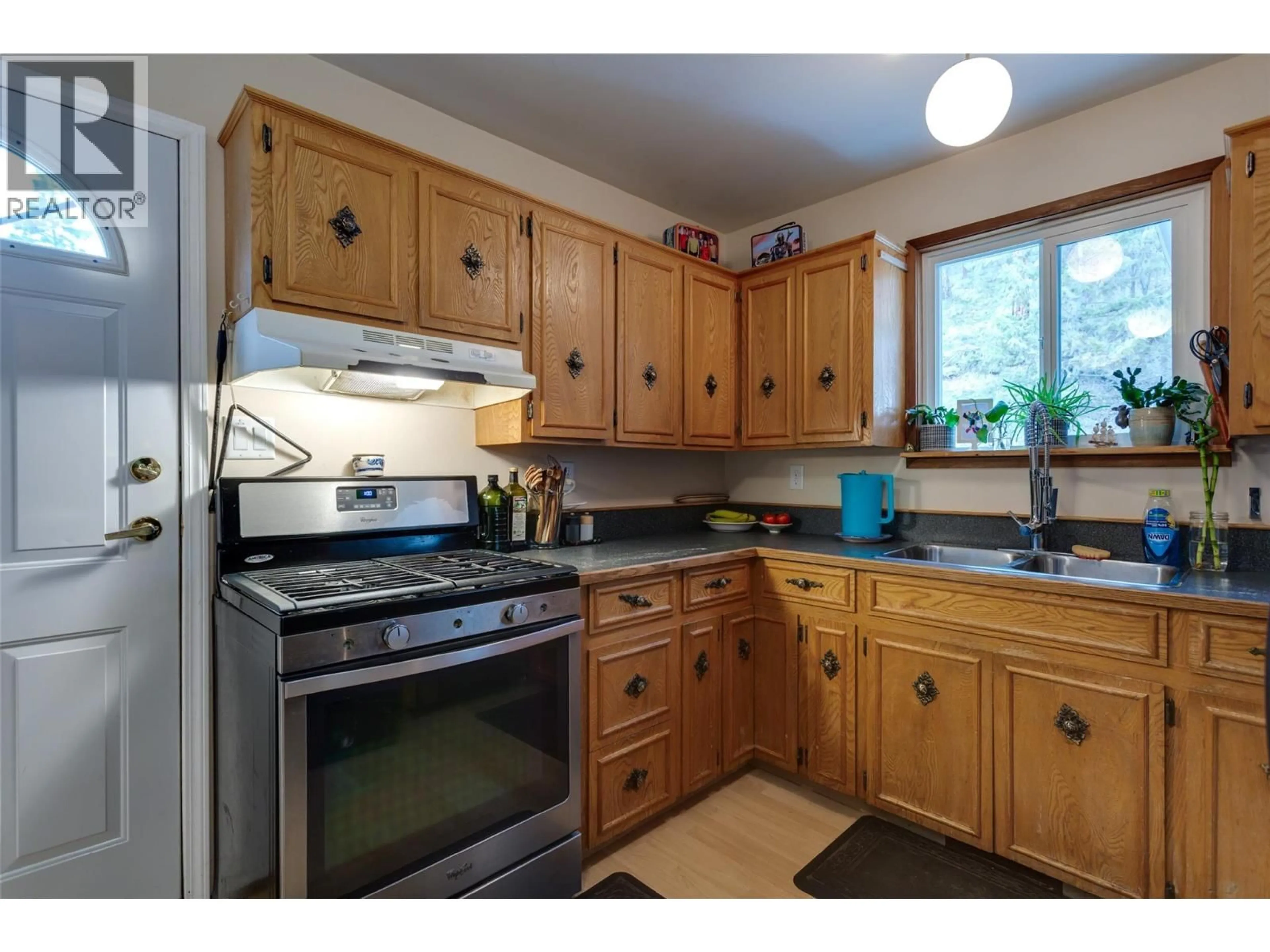 Standard kitchen, wood/laminate floor for 15130 OLD MISSION ROAD, Oyama British Columbia V4V2A9