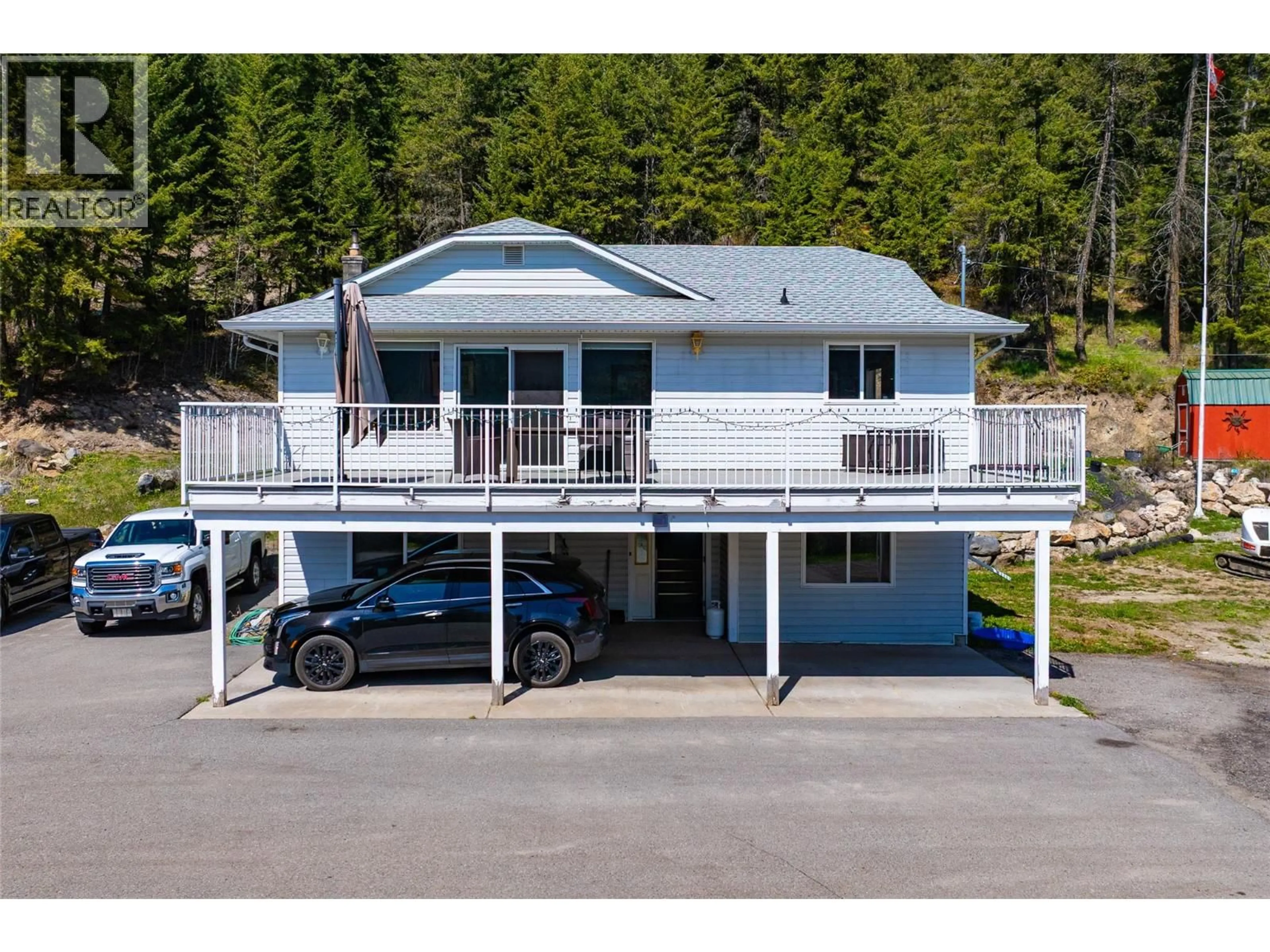 A pic from outside/outdoor area/front of a property/back of a property/a pic from drone, water/lake/river/ocean view for 7114 GOSHAWK ROAD, Kelowna British Columbia V1P1H9